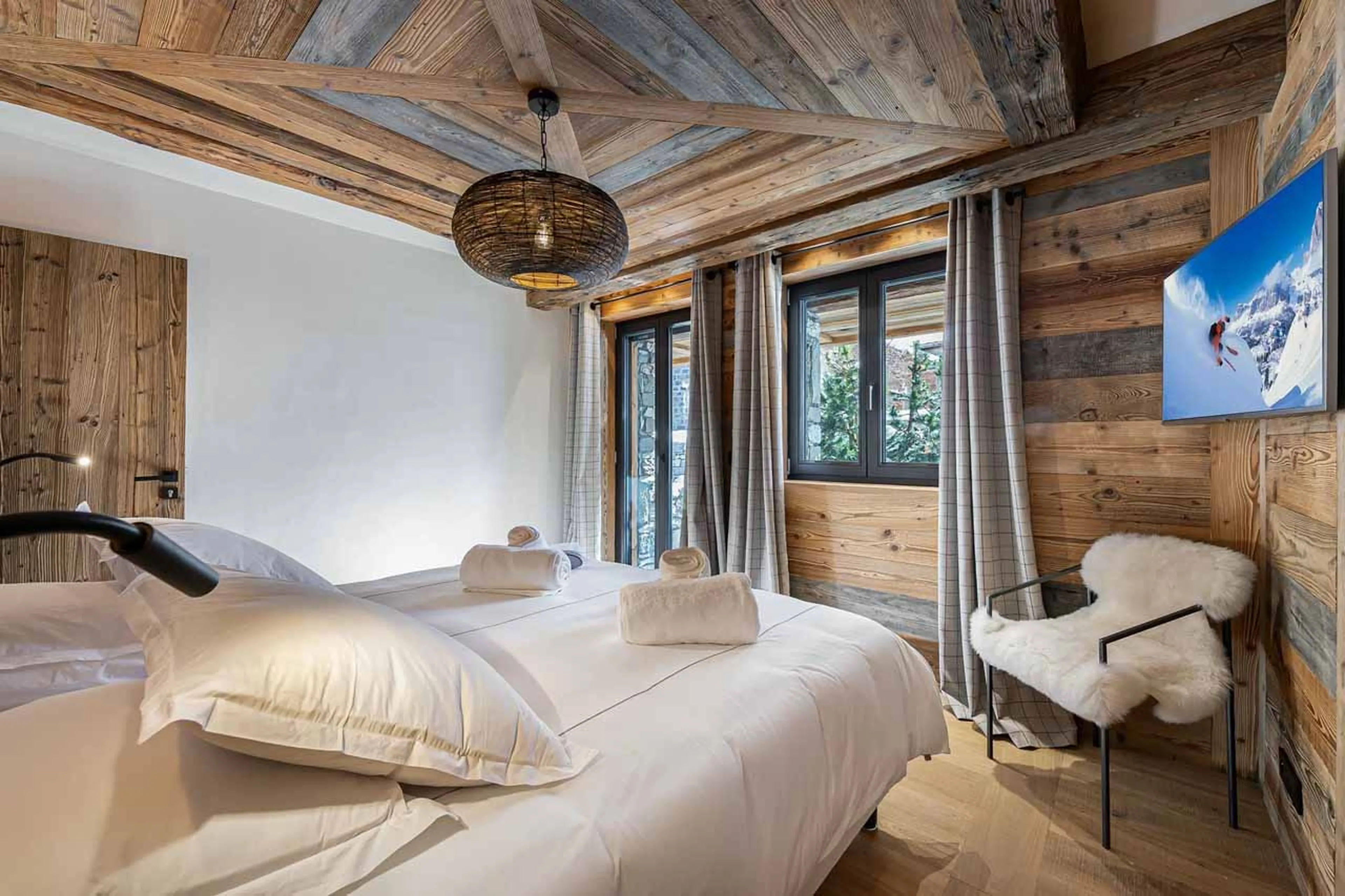 TV in double bedroom at Chalet Angelus 1 in Val d'Isere
