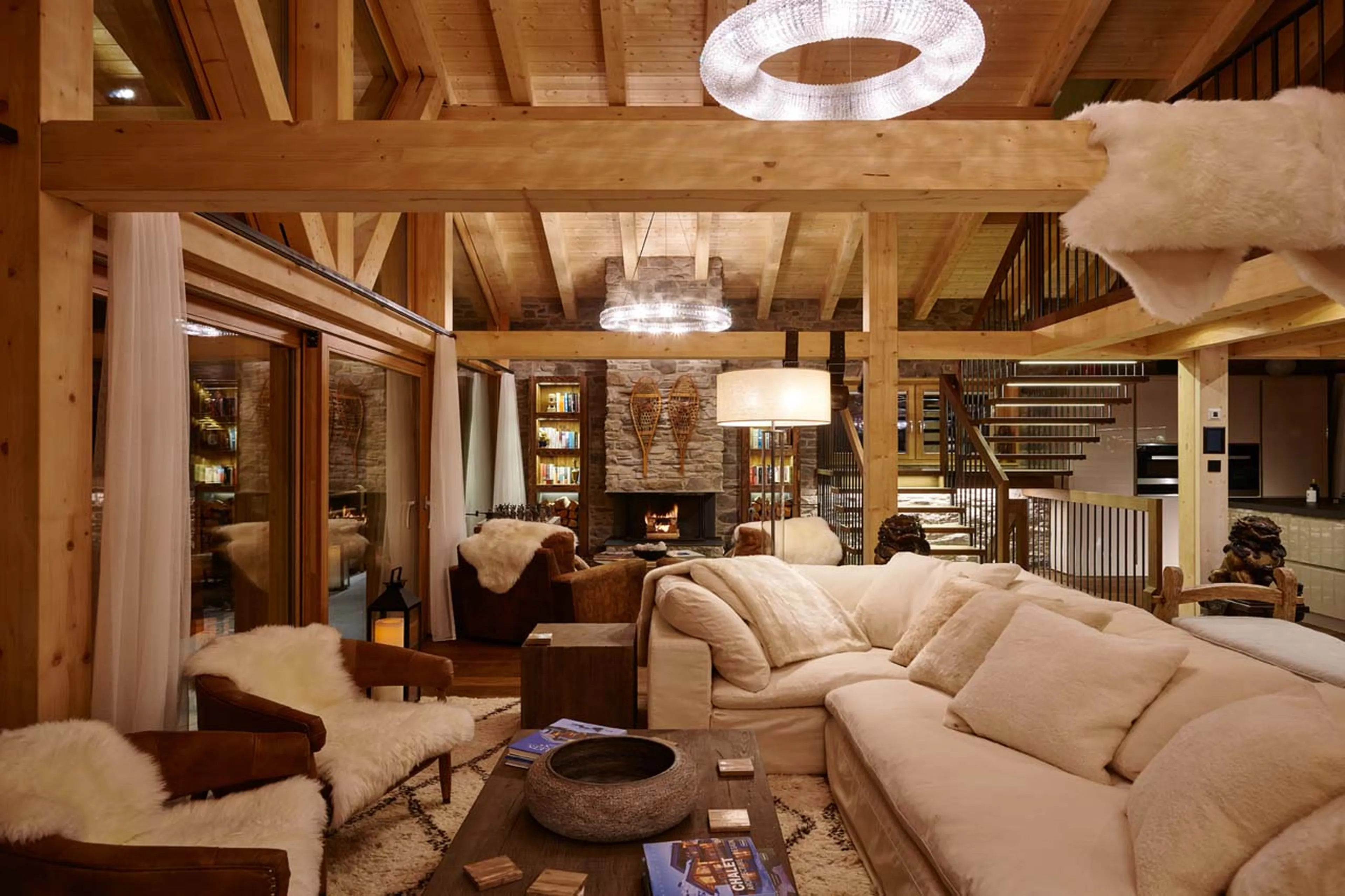Living area at night of Chalet Annapurna in Saas Fee
