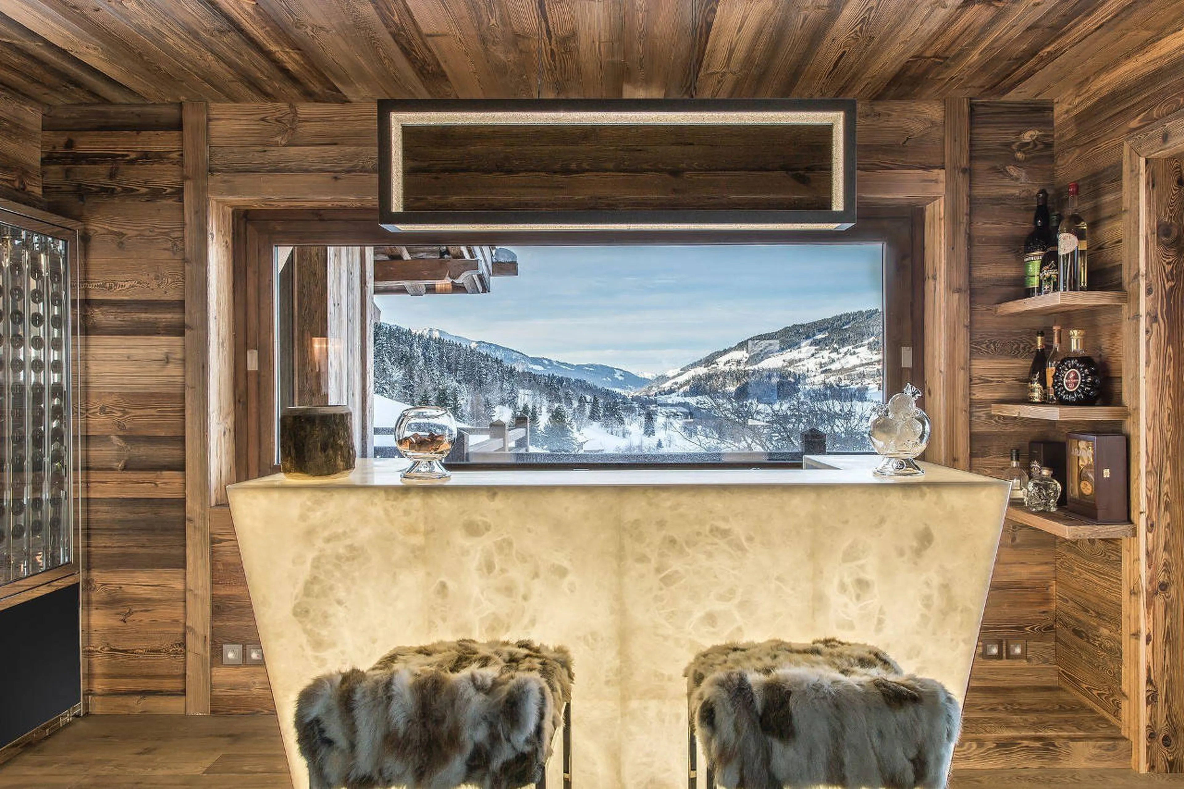 Old wood panelling on the walls create a special atmosphere in Chalet Ararat in Megeve