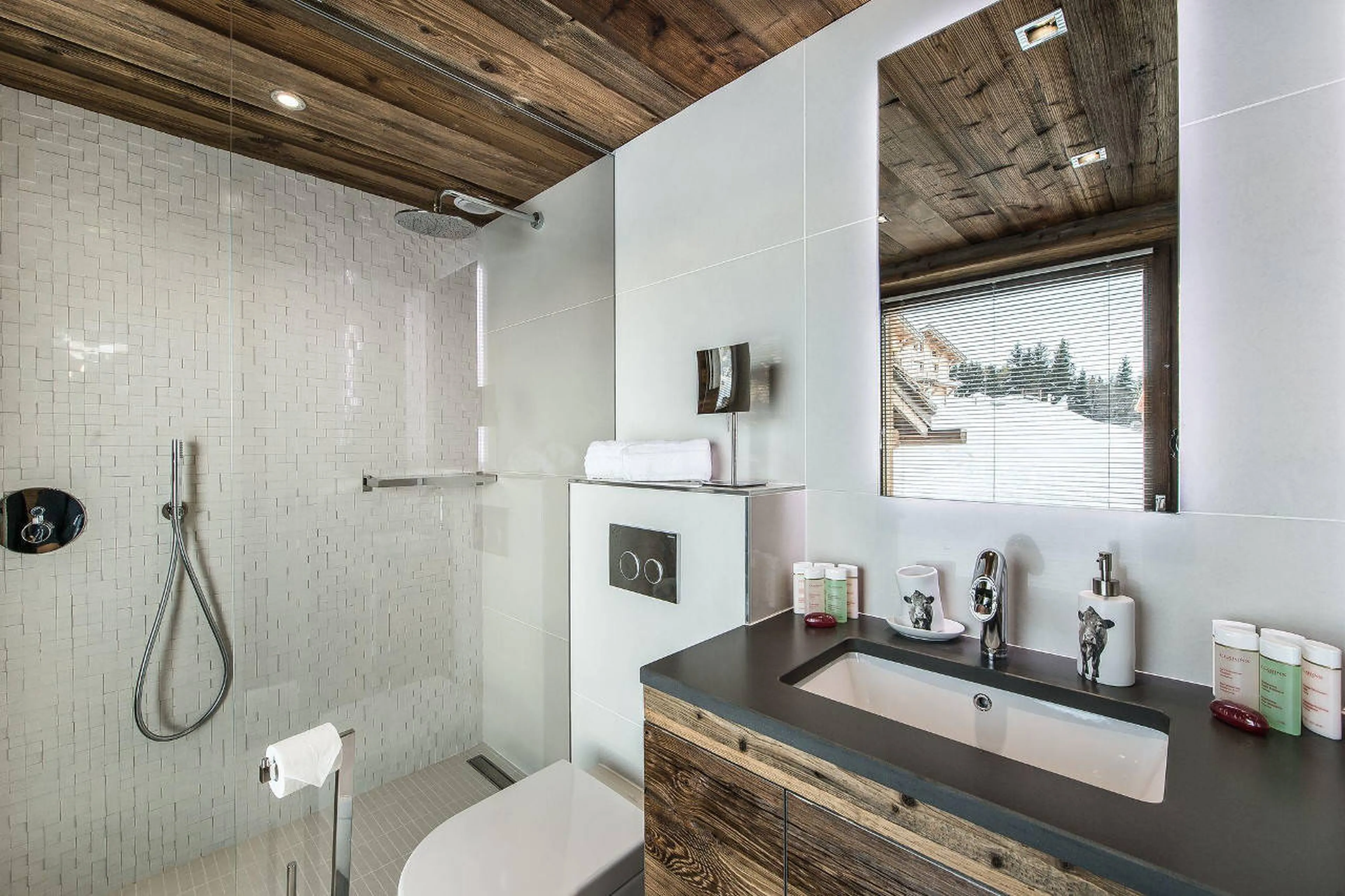Shower room en suite to double bedroom in Chalet Ararat in Megeve