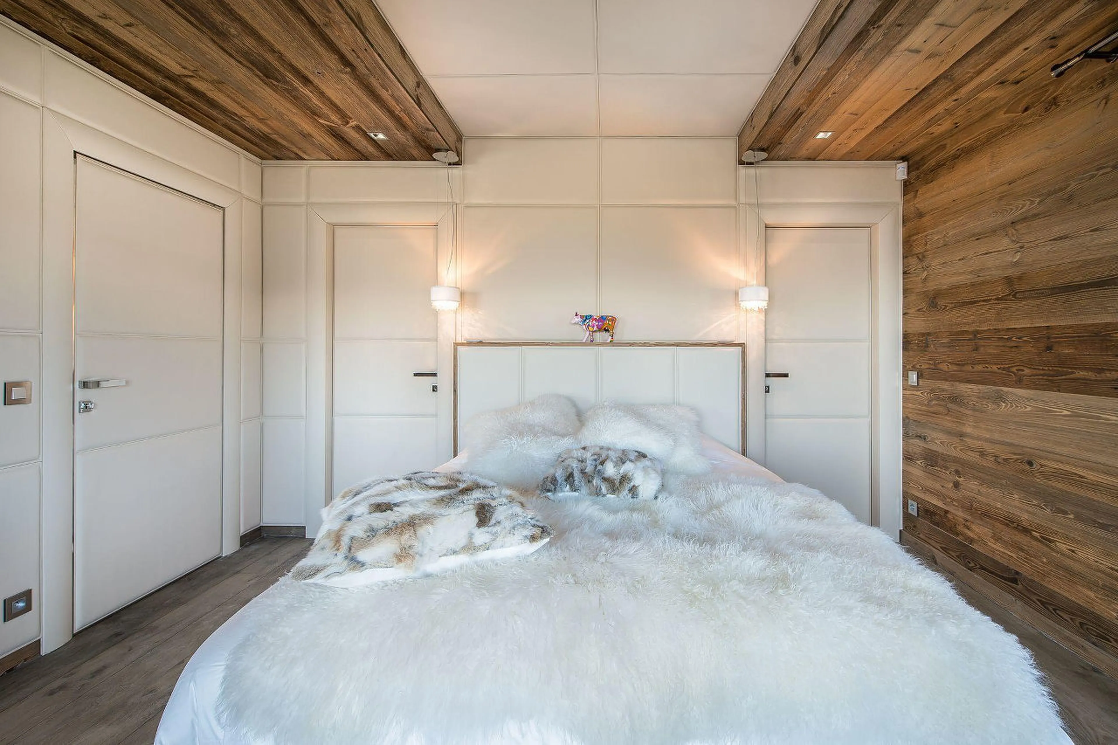 Double bedroom with en suite shower room in Chalet Ararat in Megeve