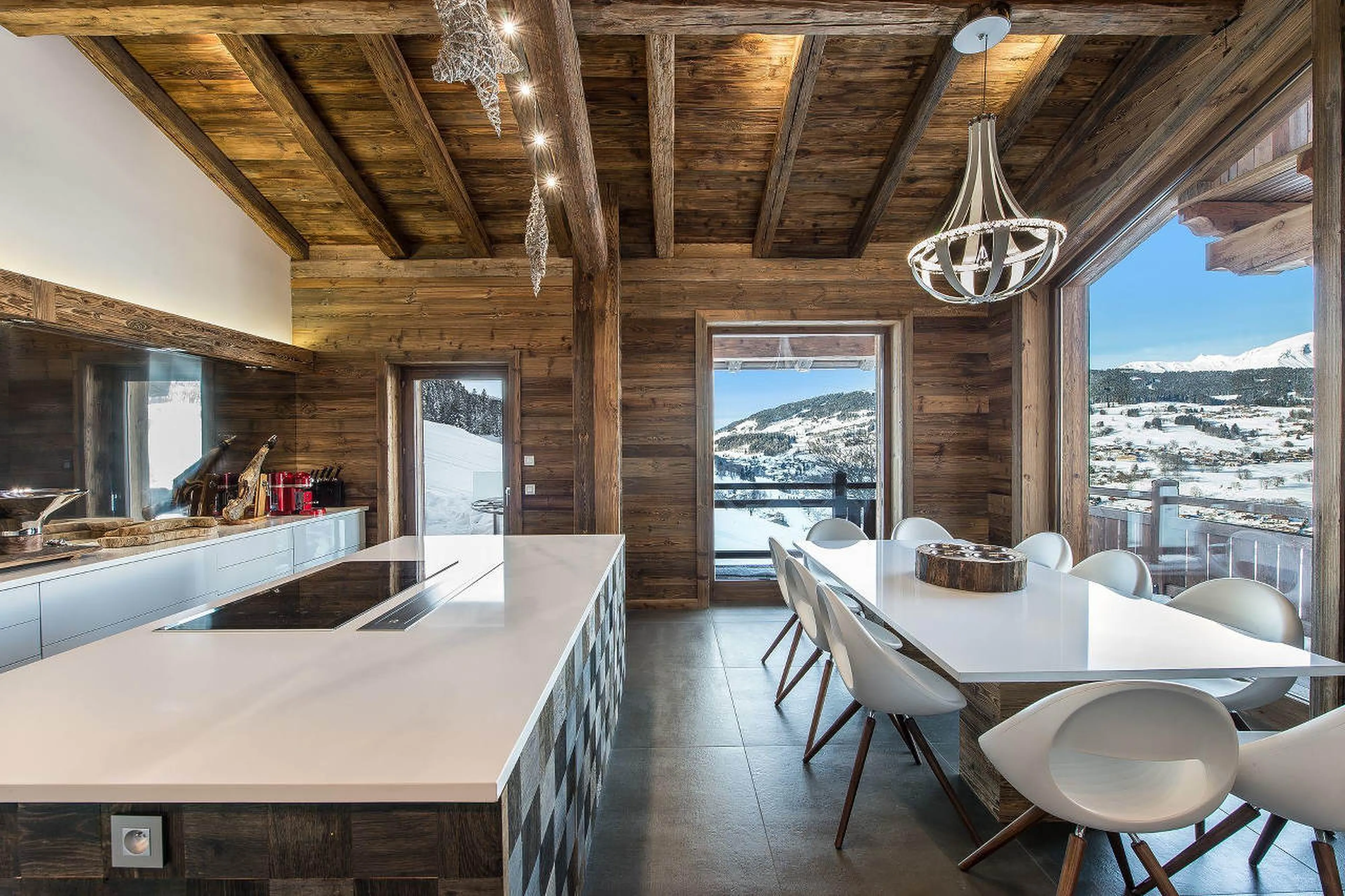 The kitchen in Chalet Ararat in Megeve, with its own dining area