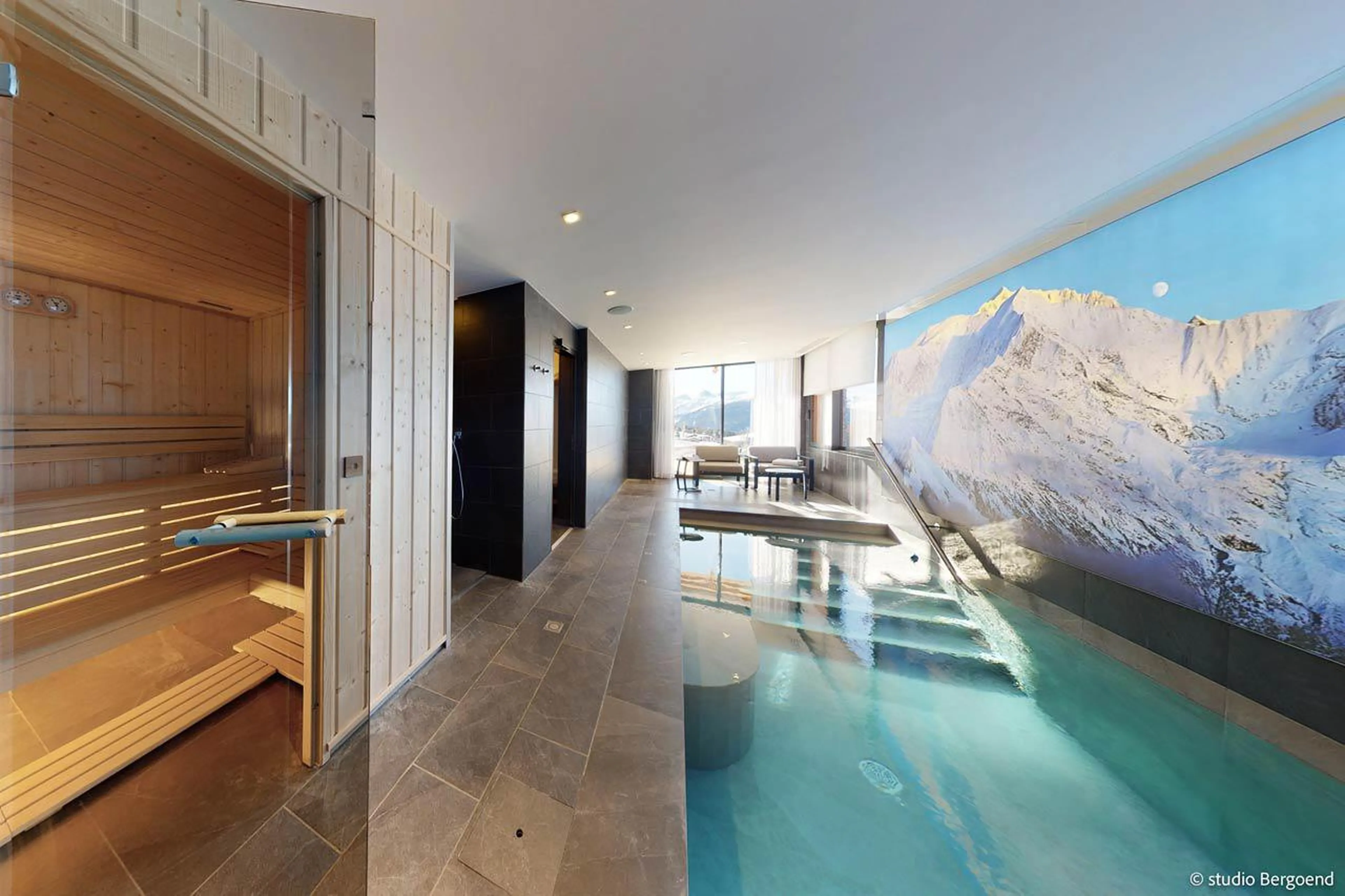 Spa area including heated swimming pool, sauna and two Italian showers at Chalet Arpoza in Les Arcs