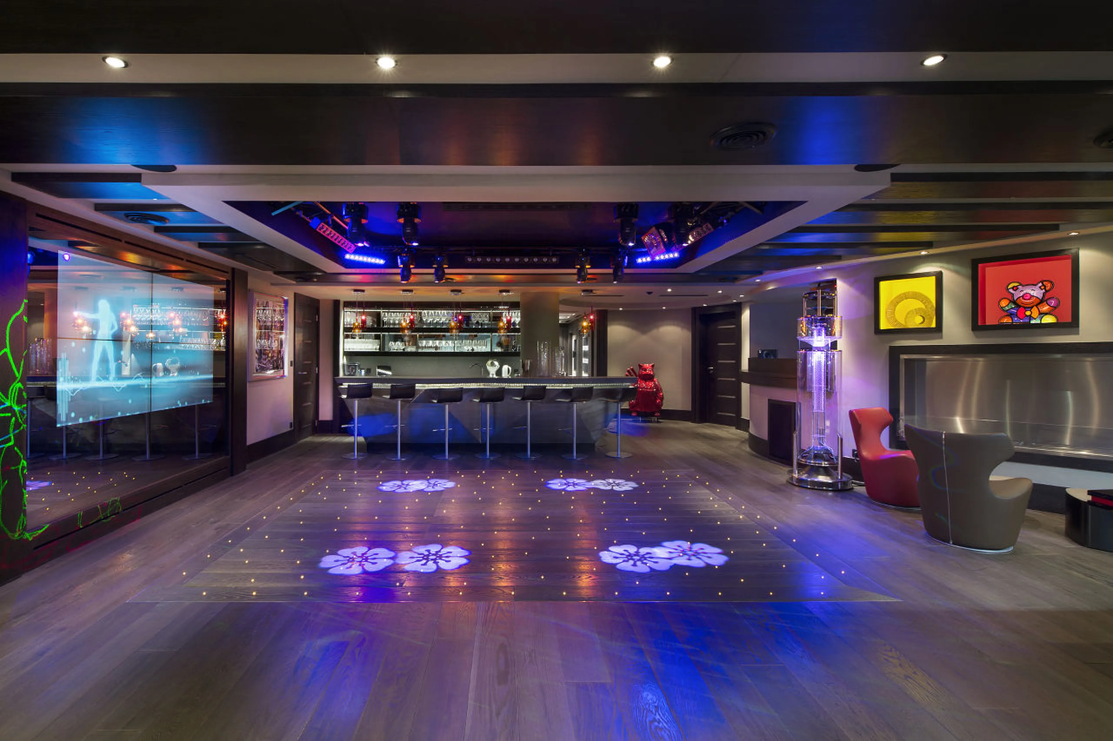 Quadruple screens in night club area of Chalet Art in Courchevel 1850