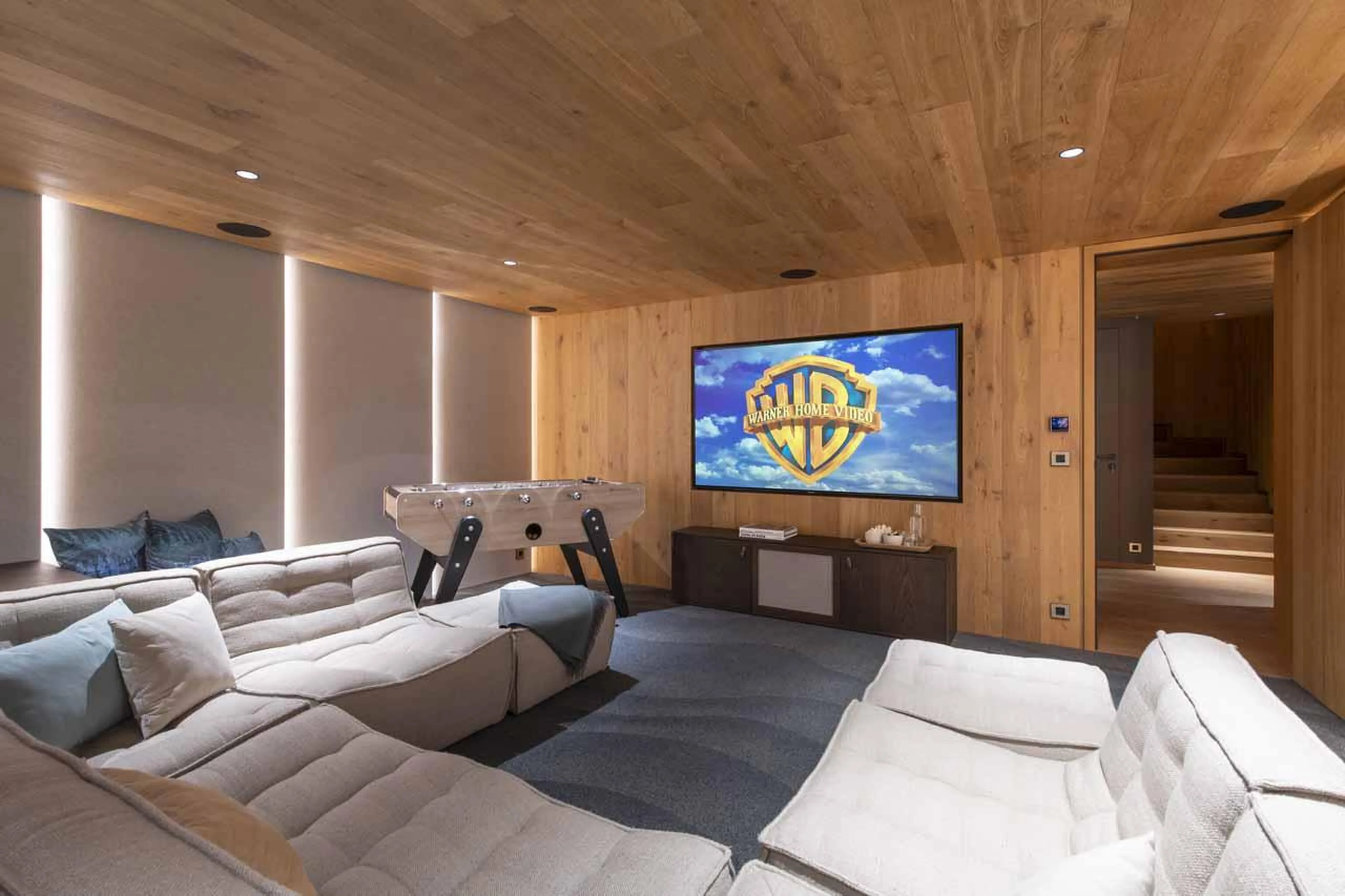 Large wrap-around sofa and TV in Chalet Ascension, Courchevel 1650