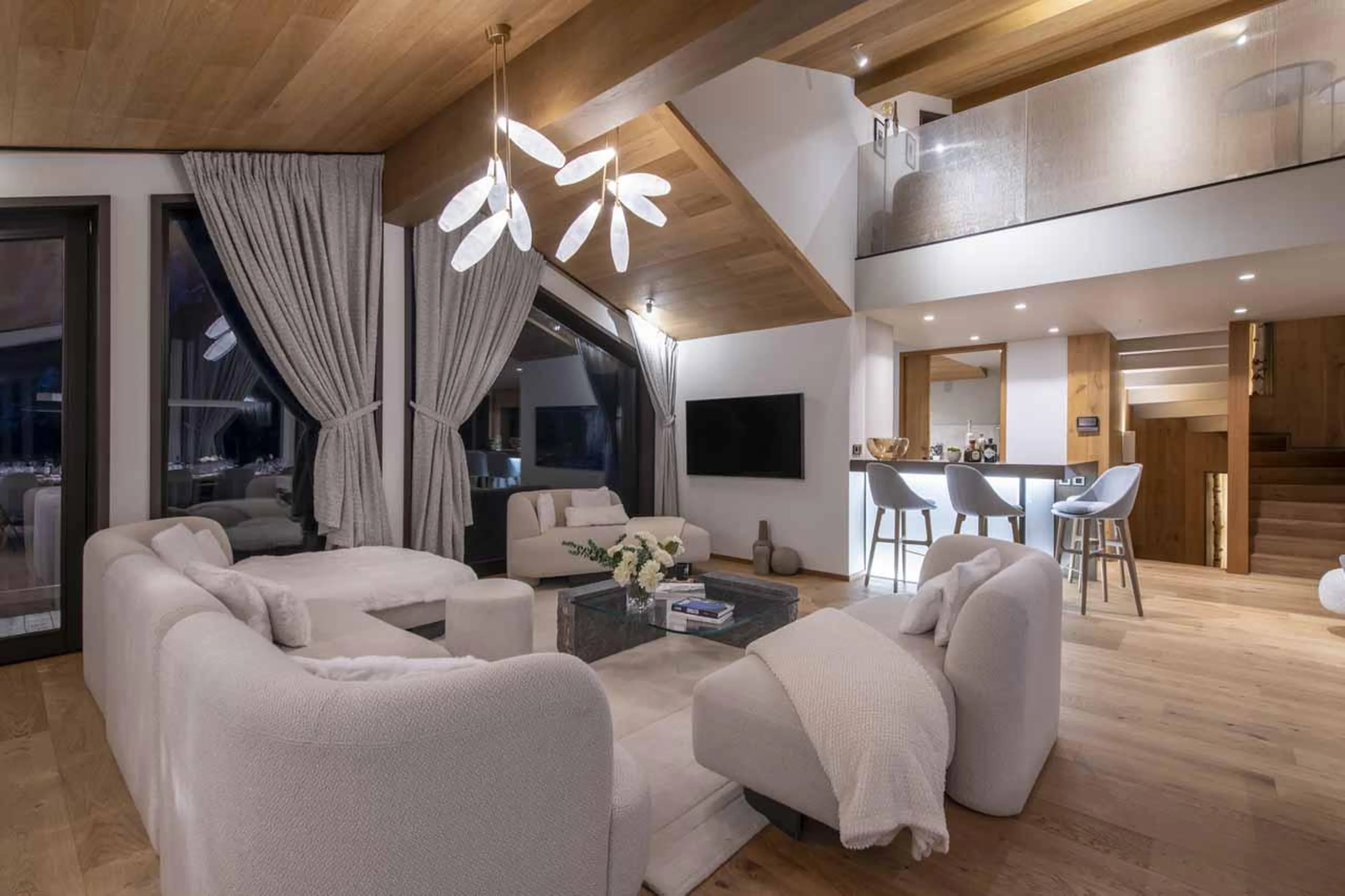 Light sofas, coffee table and bar in Chalet Ascension, Courchevel 1650