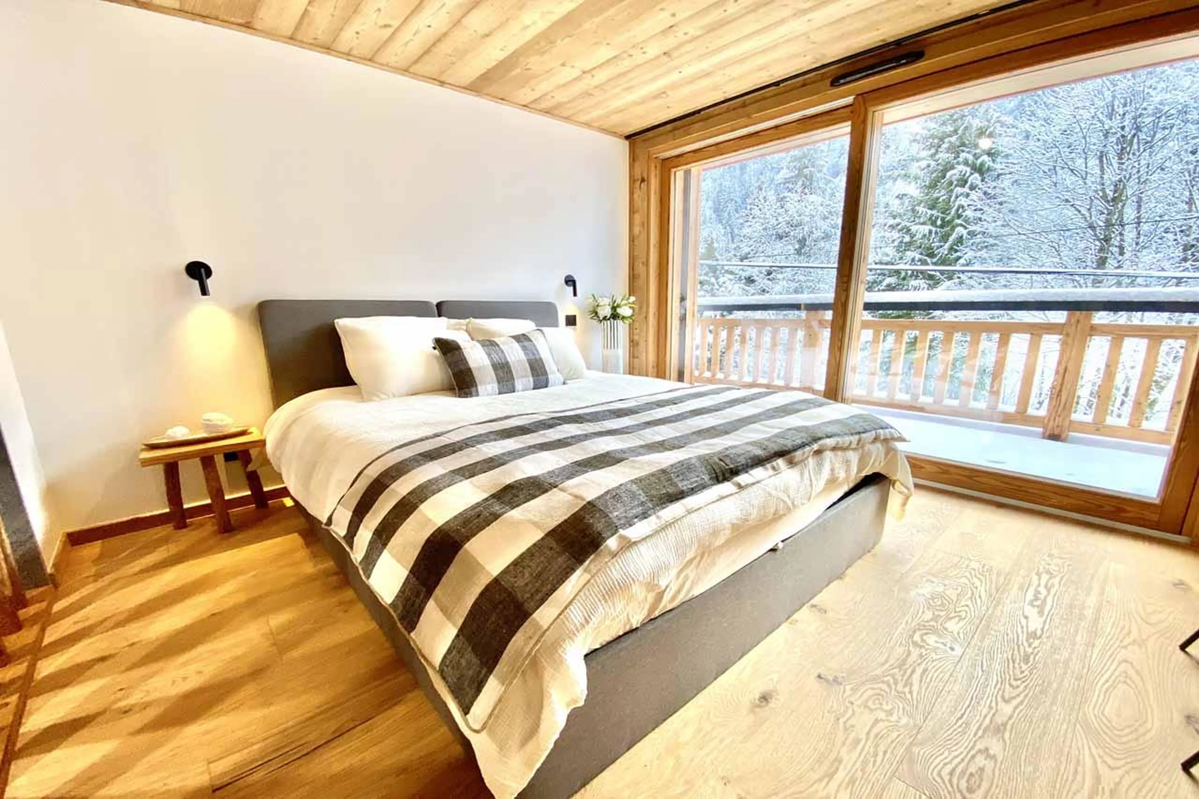 Double bedroom with sliding glass doors in Chalet Asgard, Morzine