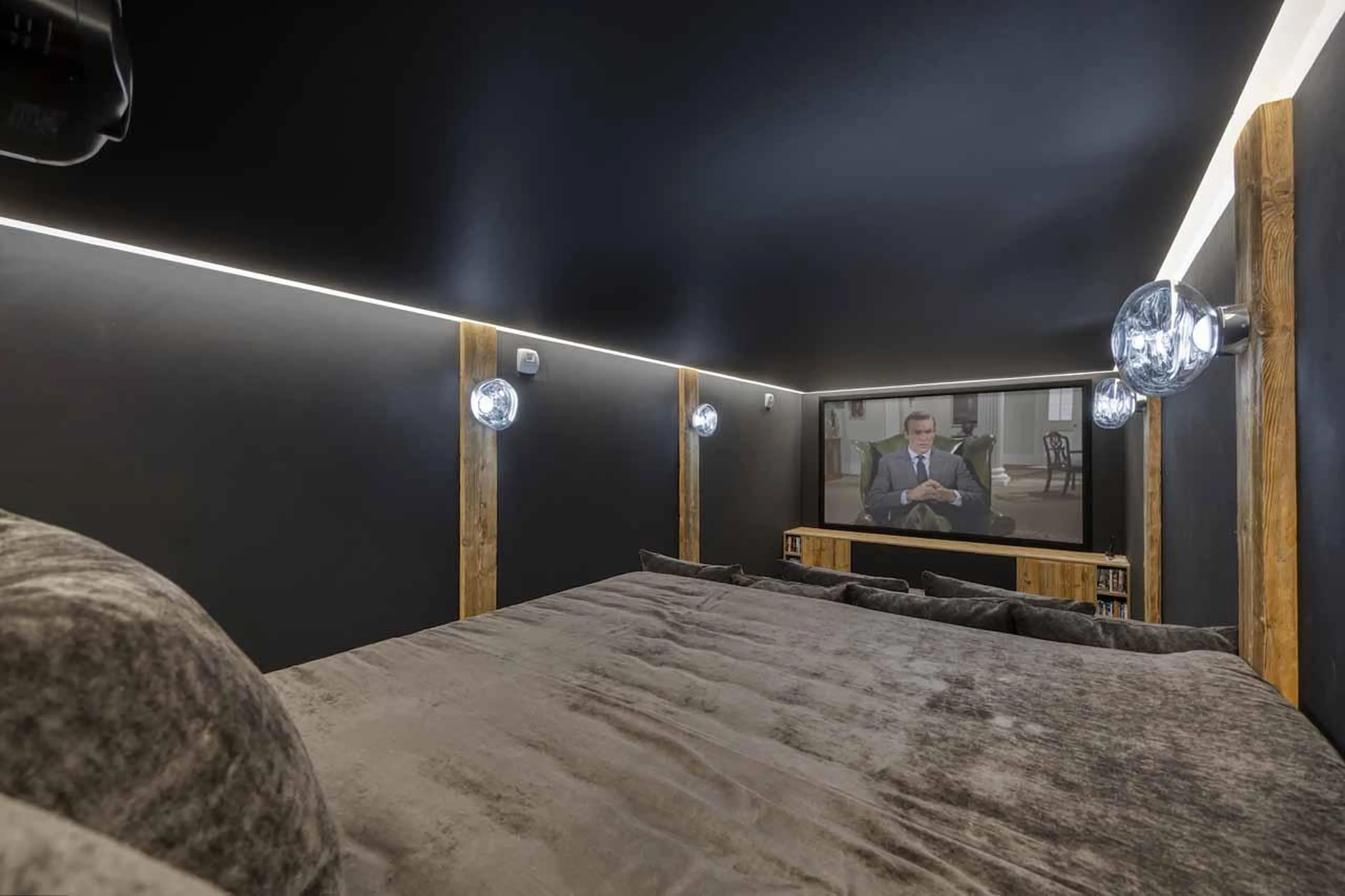 Bed-like seating in cinema room in Chalet Aspen, Megeve