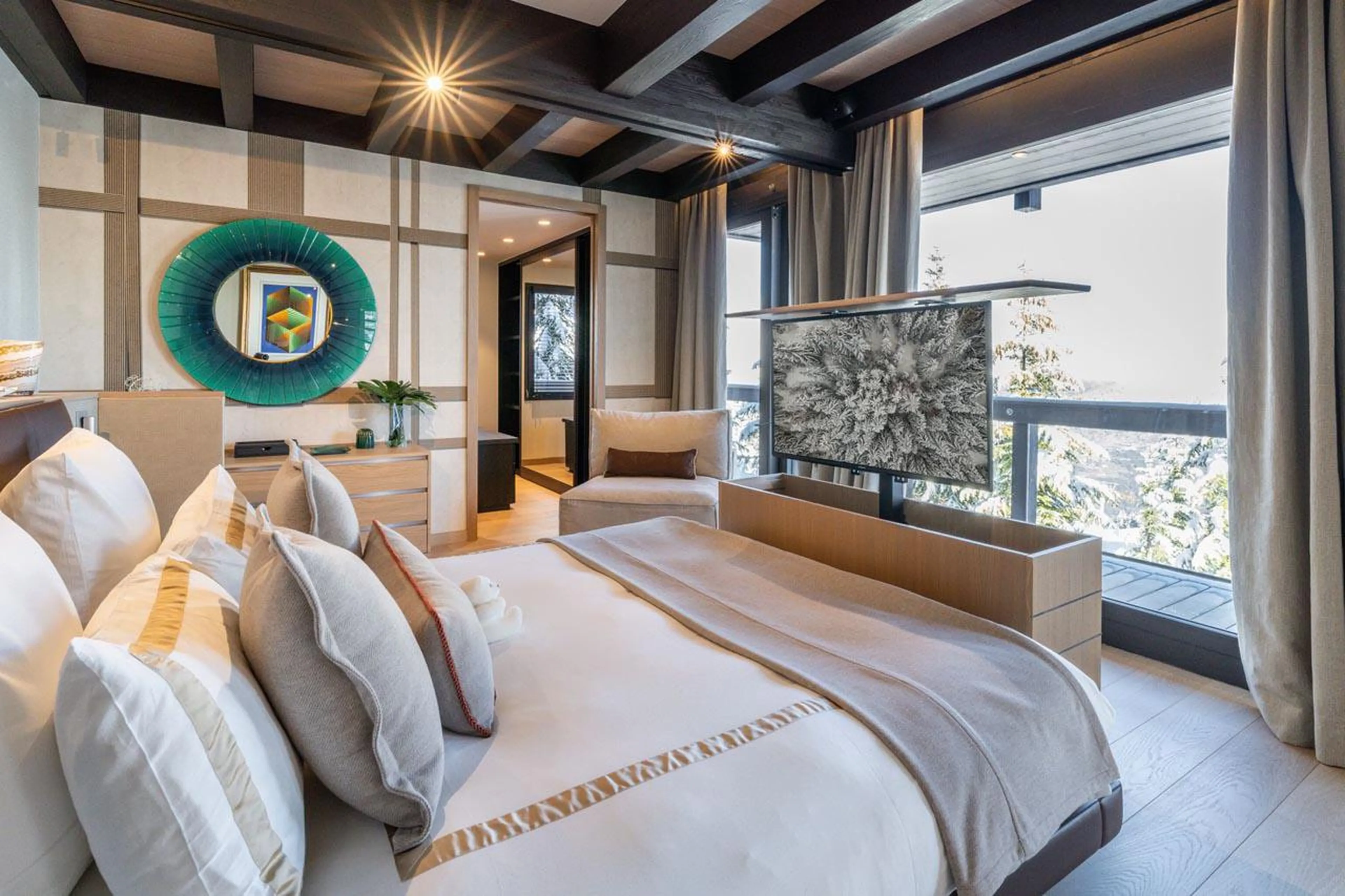 Master double bedroom with TV, dressing room, balcony access and en-suite bathroom