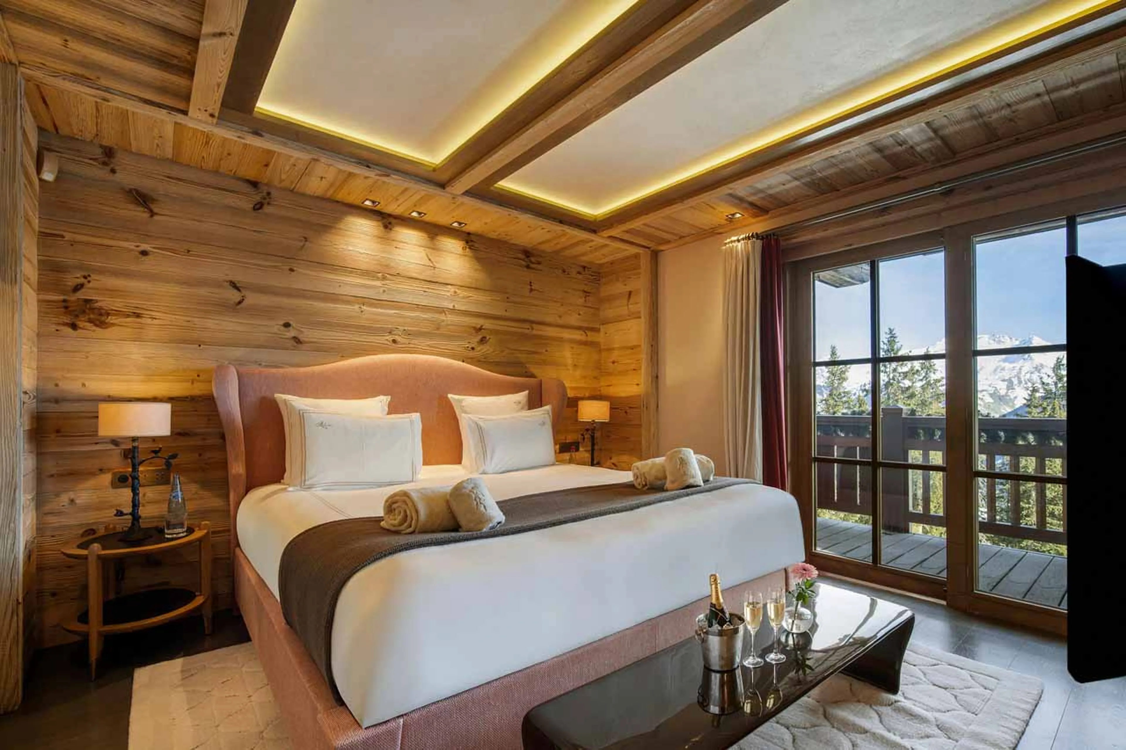 Master bedroom suite with balcony access in Chalet Les Bastidons  in Courchevel 1850