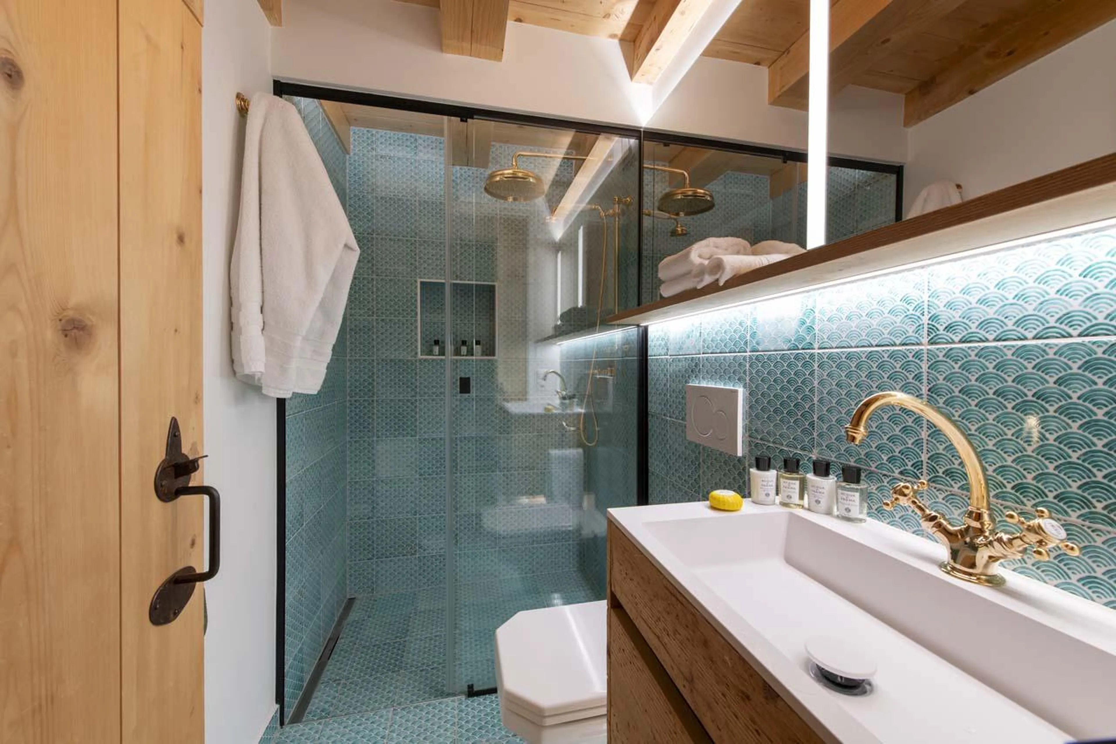Shower room shared between bedrooms three and four at Chalet Bavaria in Verbier