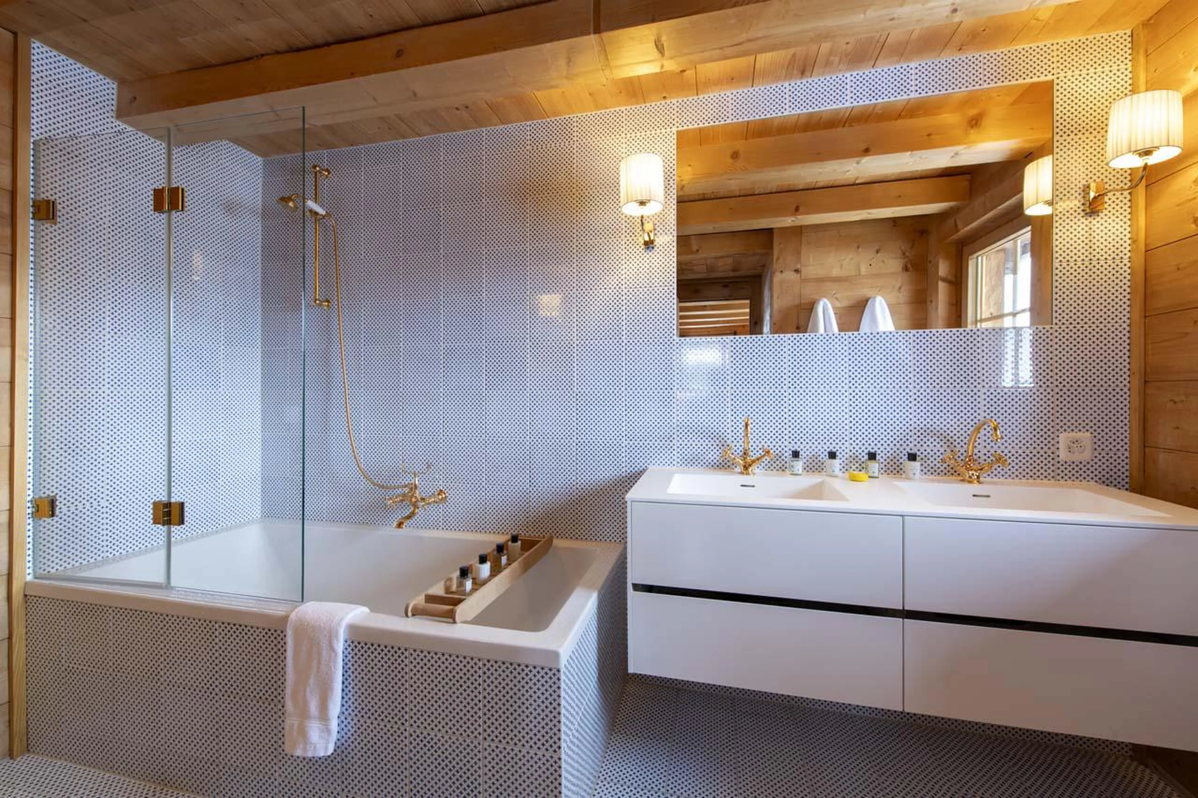 En-suite bathroom with double basin at Chalet Bavaria in Verbier