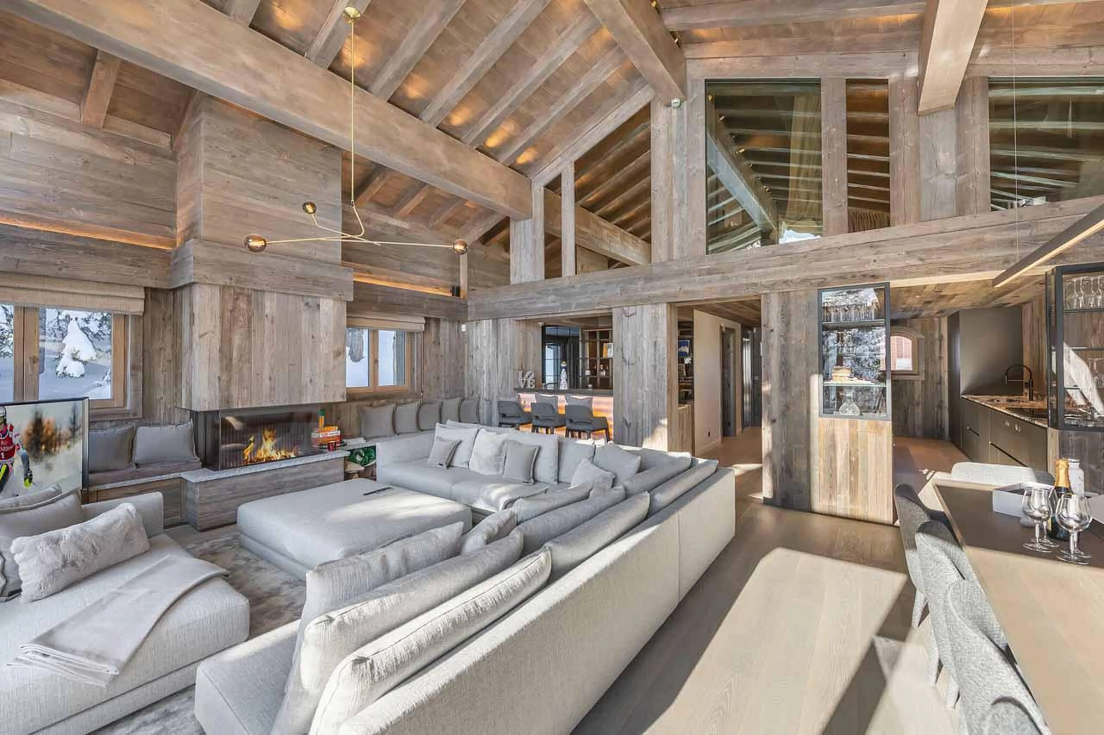Living area & kitchen at Chalet Bellarossa in Courchevel 1850