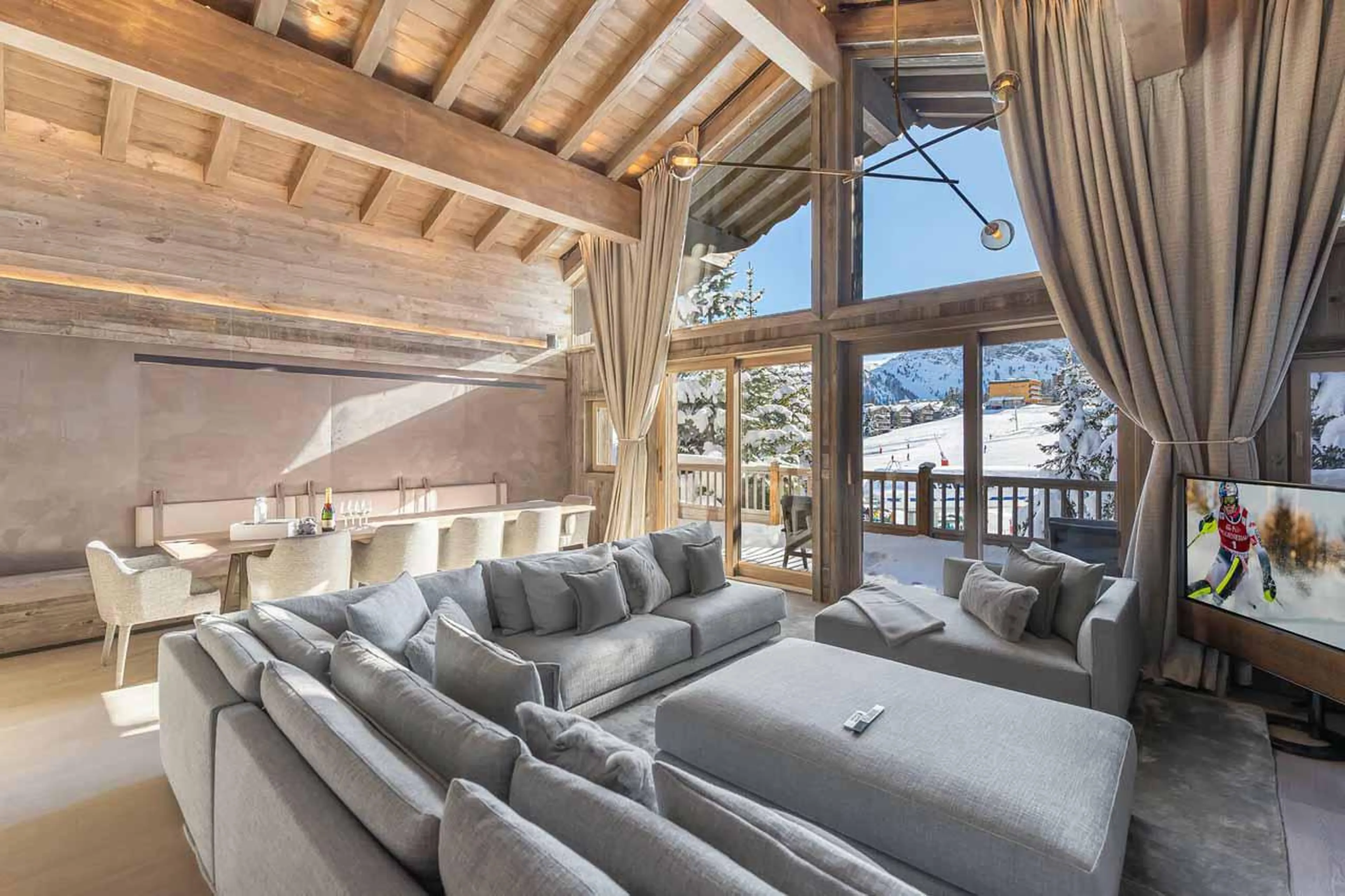 Living & dining area at Chalet Bellarossa in Courchevel 1850