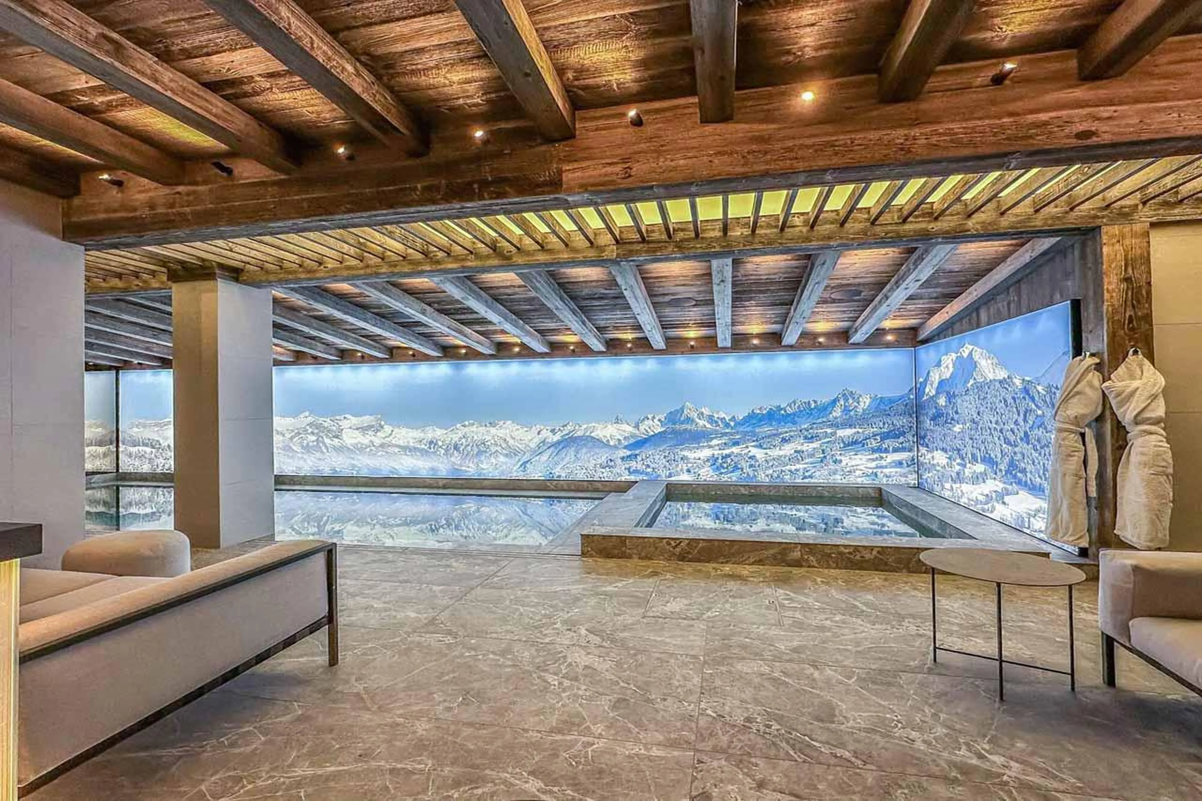 Pool and relaxation area at Chalet Bellarossa in Courchevel 1850