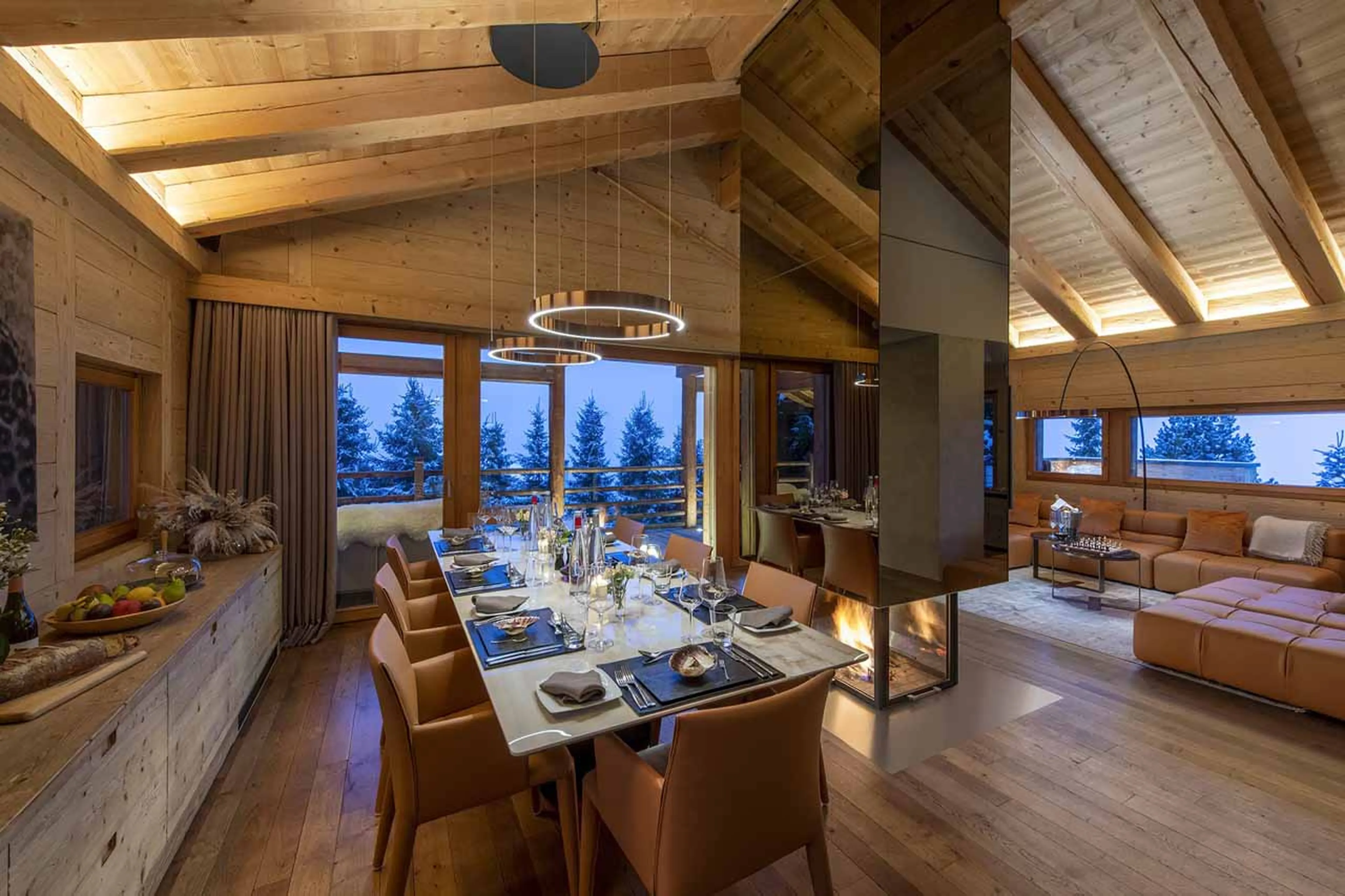Dining table at night in Chalet Belle Claire in Verbier