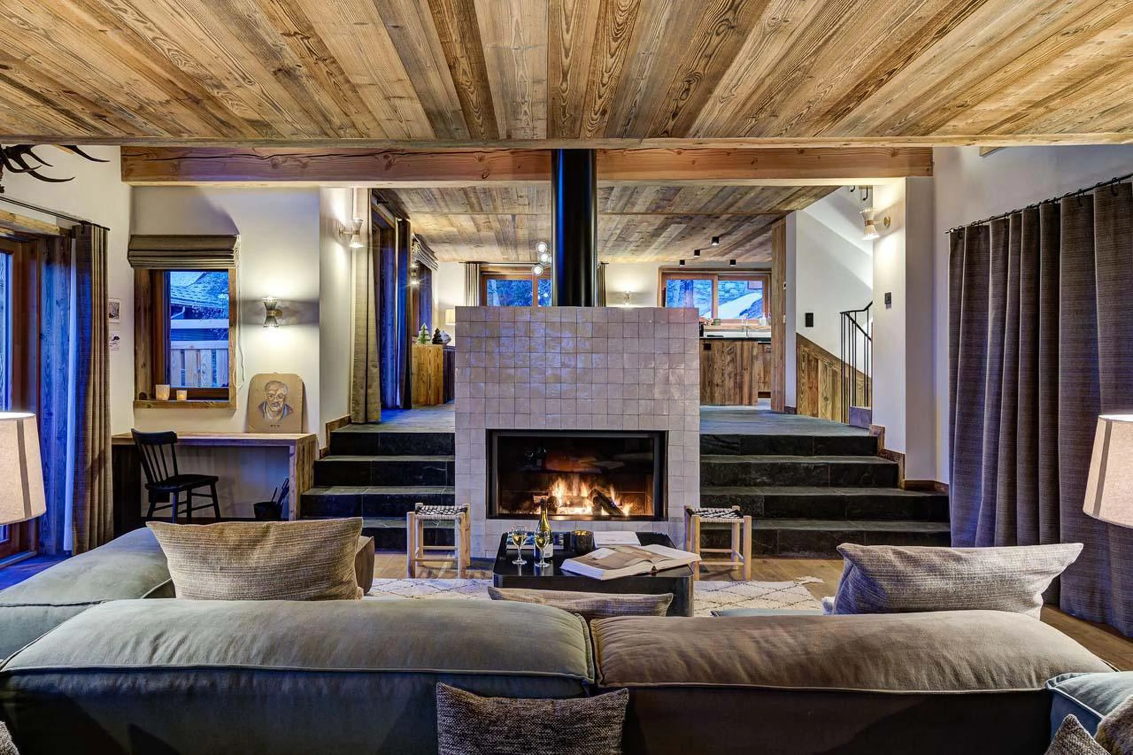 Living area lying adjacent to the dining space at Chalet Bergeronnette in Meribel