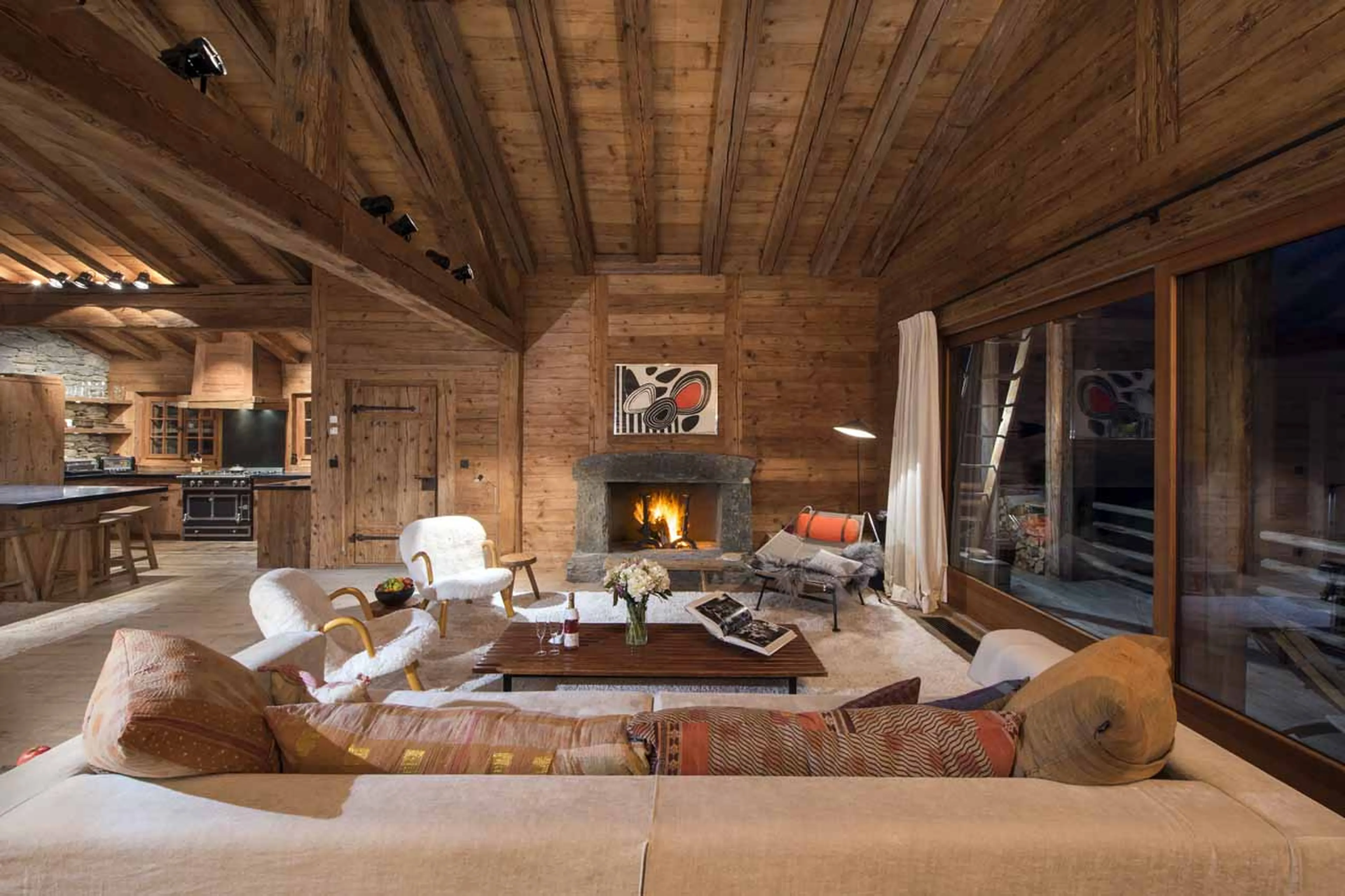 Living area with fireplace at Chalet Bibi in Verbier