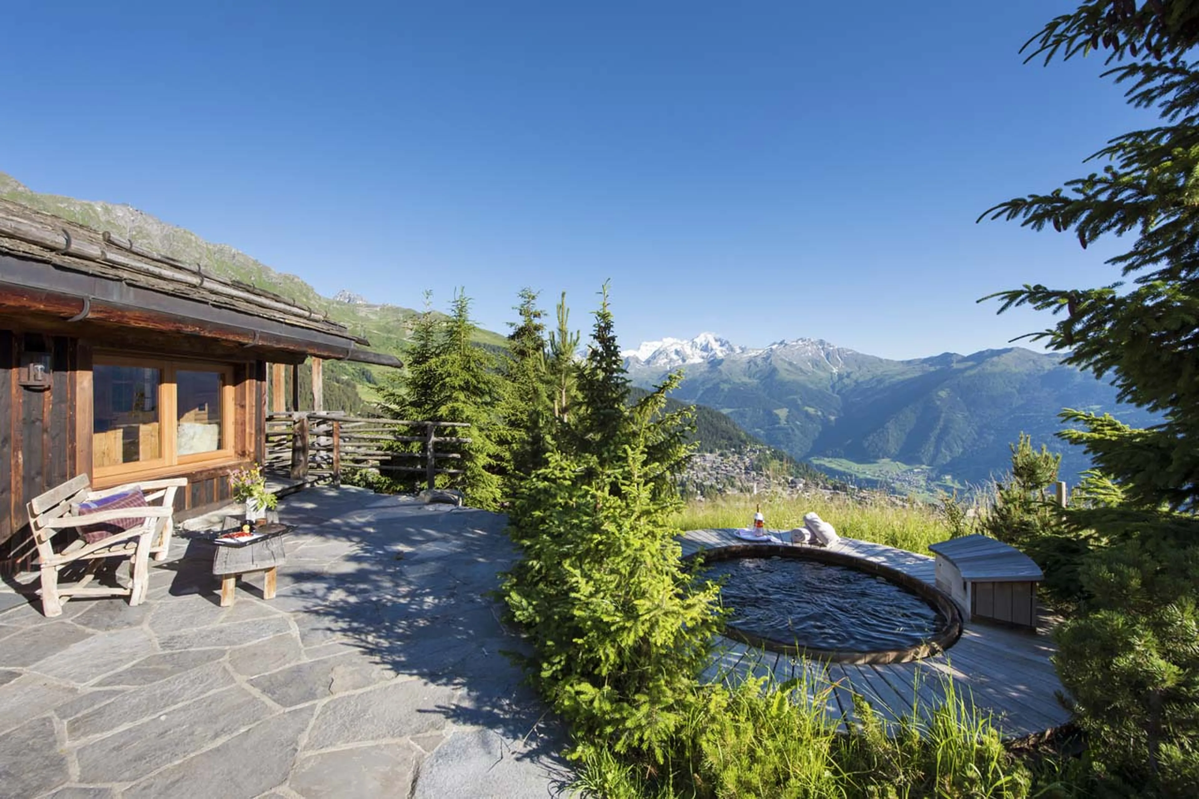 Terrace with cedar hot tub at Chalet Bibi in Verbier