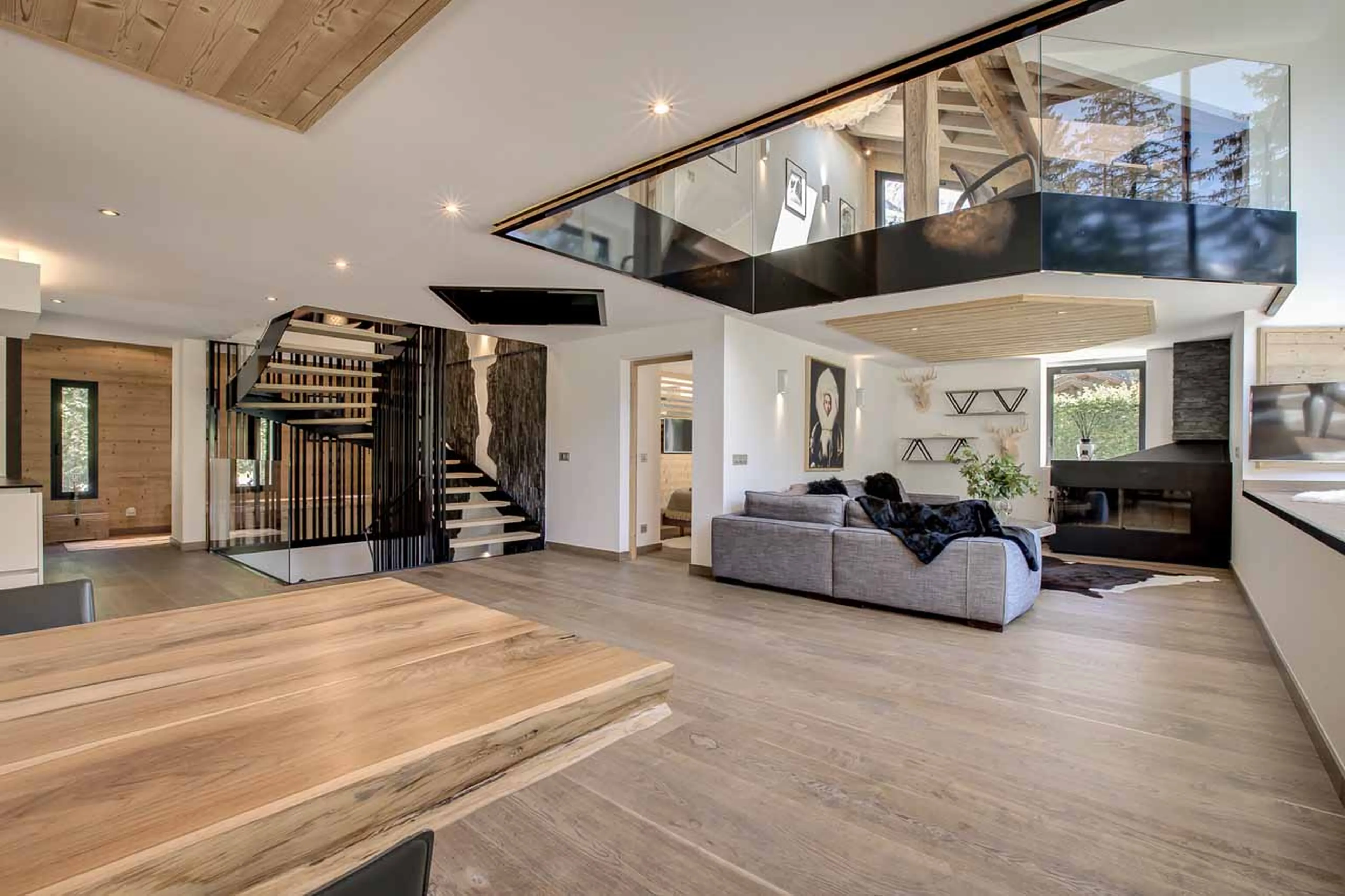 Dining table and sofa area at Chalet Black Diamond in Chamonix