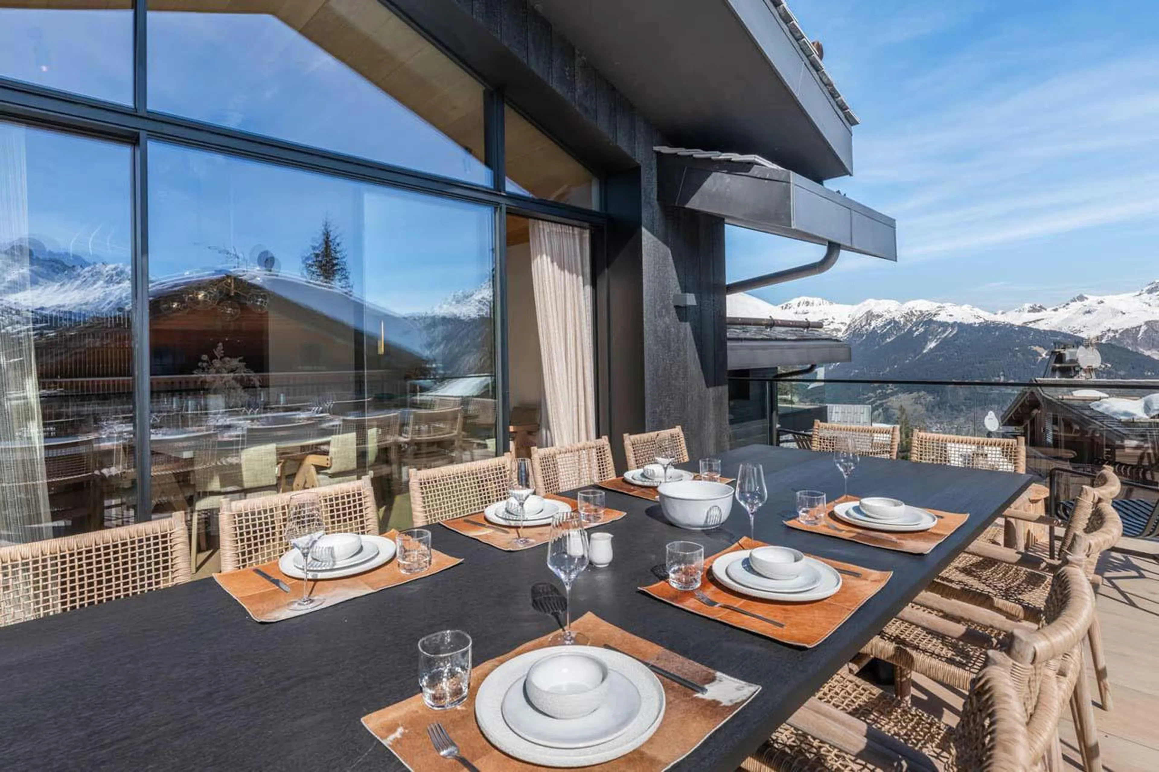 Balcony with space for al fresco dining and mountain views at Chalet Black Lodge in Courchevel 1850