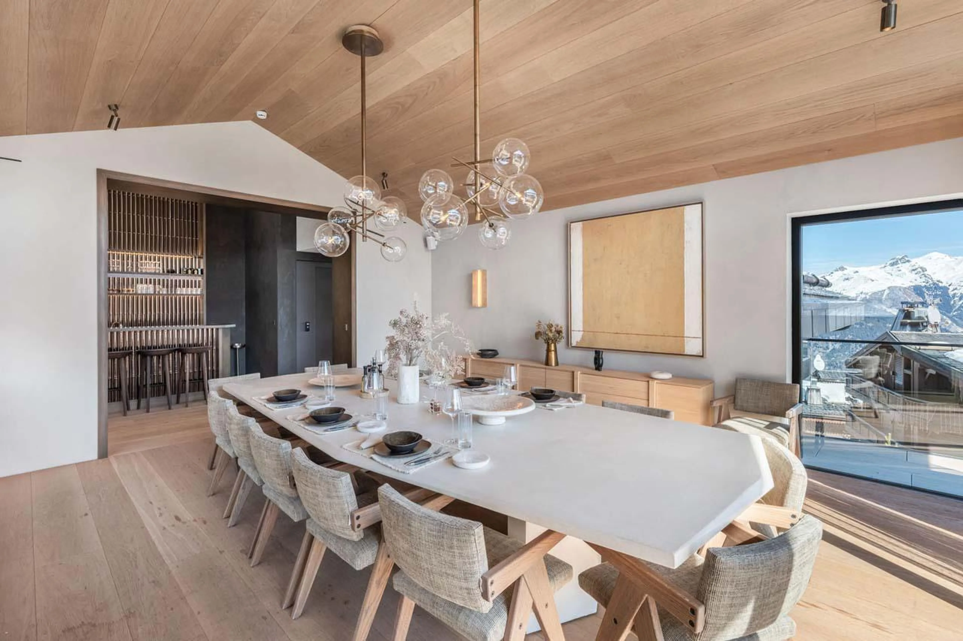 Dining table accommodating 14 guests at Chalet Black Lodge in Courchevel 1850