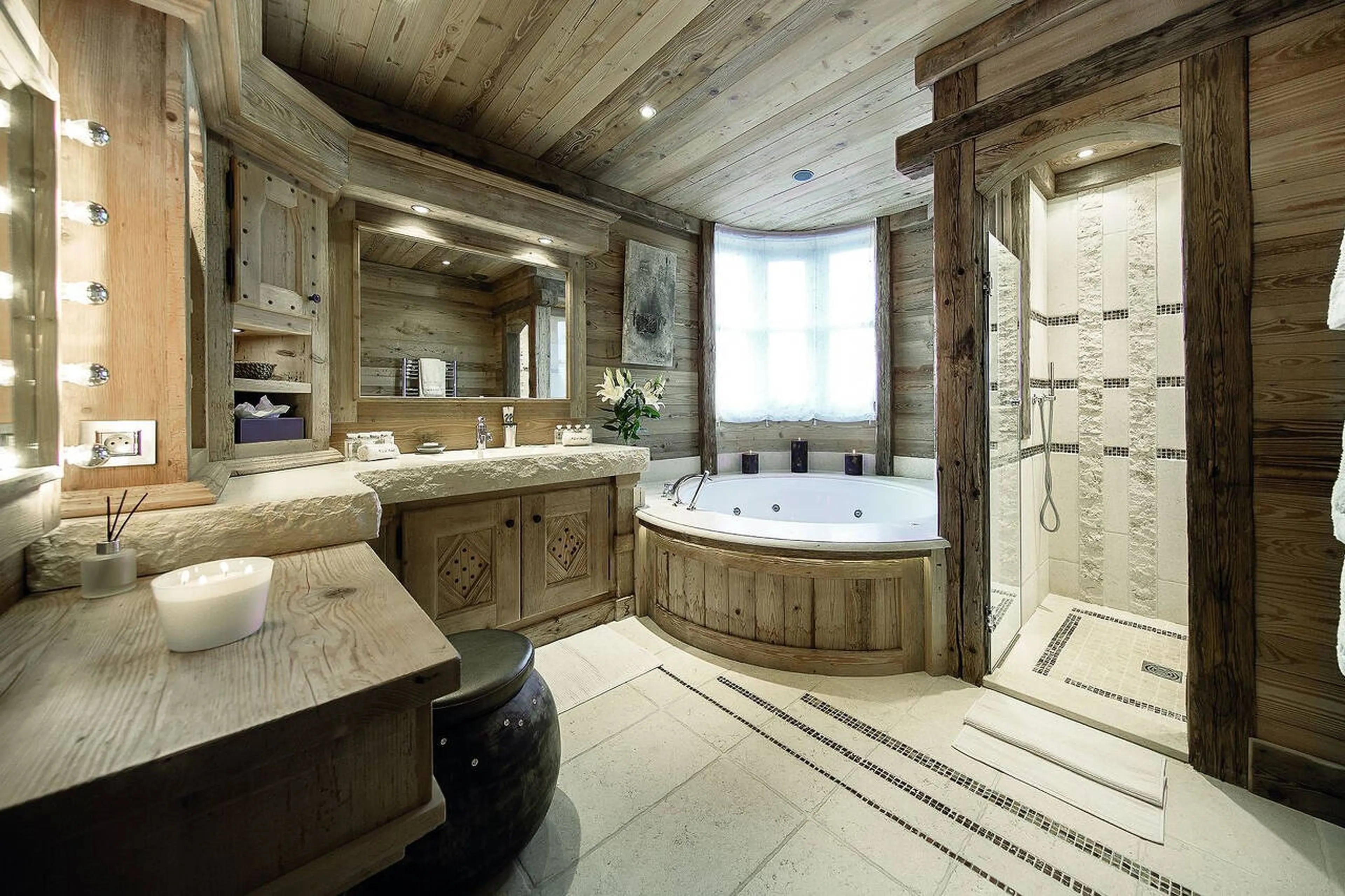 En suite bathroom with bath and walk-in shower in Chalet Black Pearl in Courchevel 1850