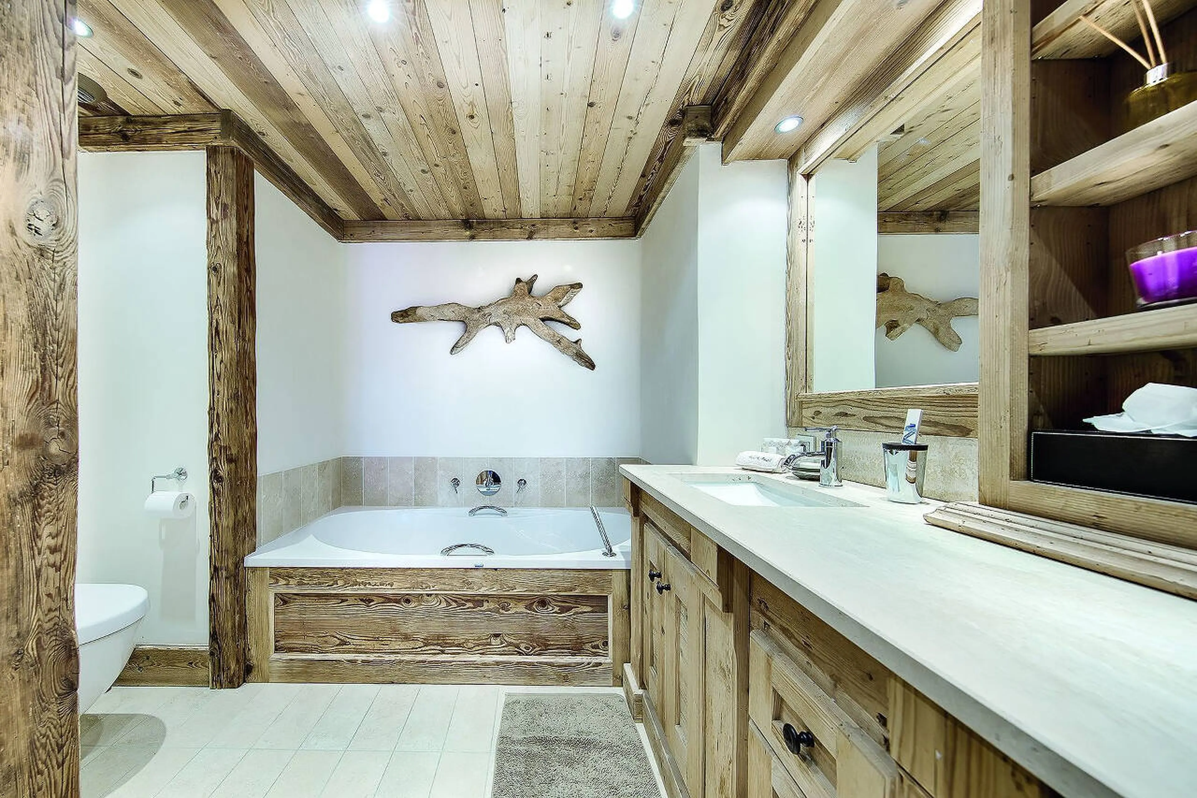 En suite bathroom with bath and walk in shower, in Chalet Black Pearl in Courchevel 1850