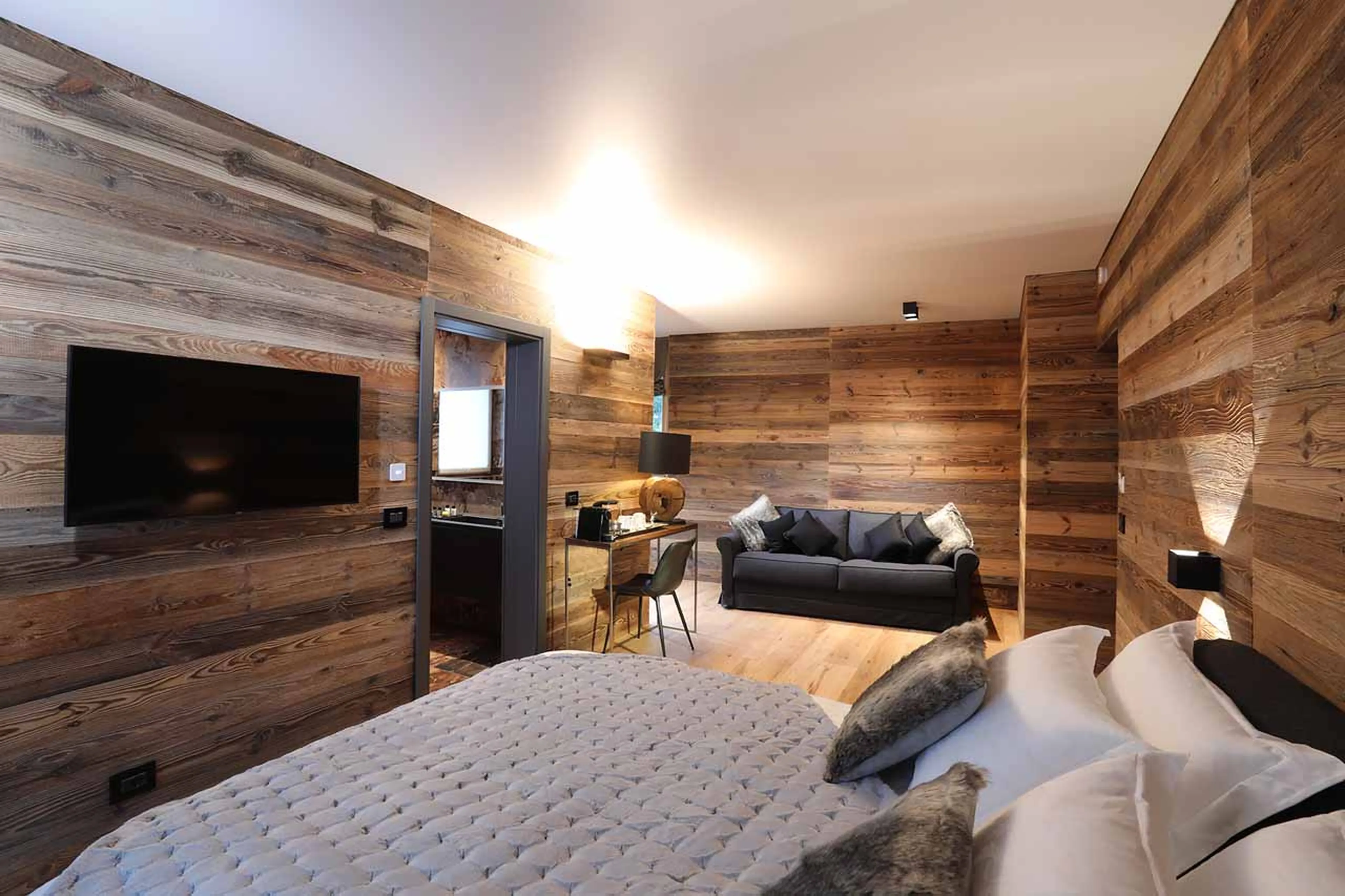 Sofa bed in bedroom five at Chalet Blanc in Cervinia