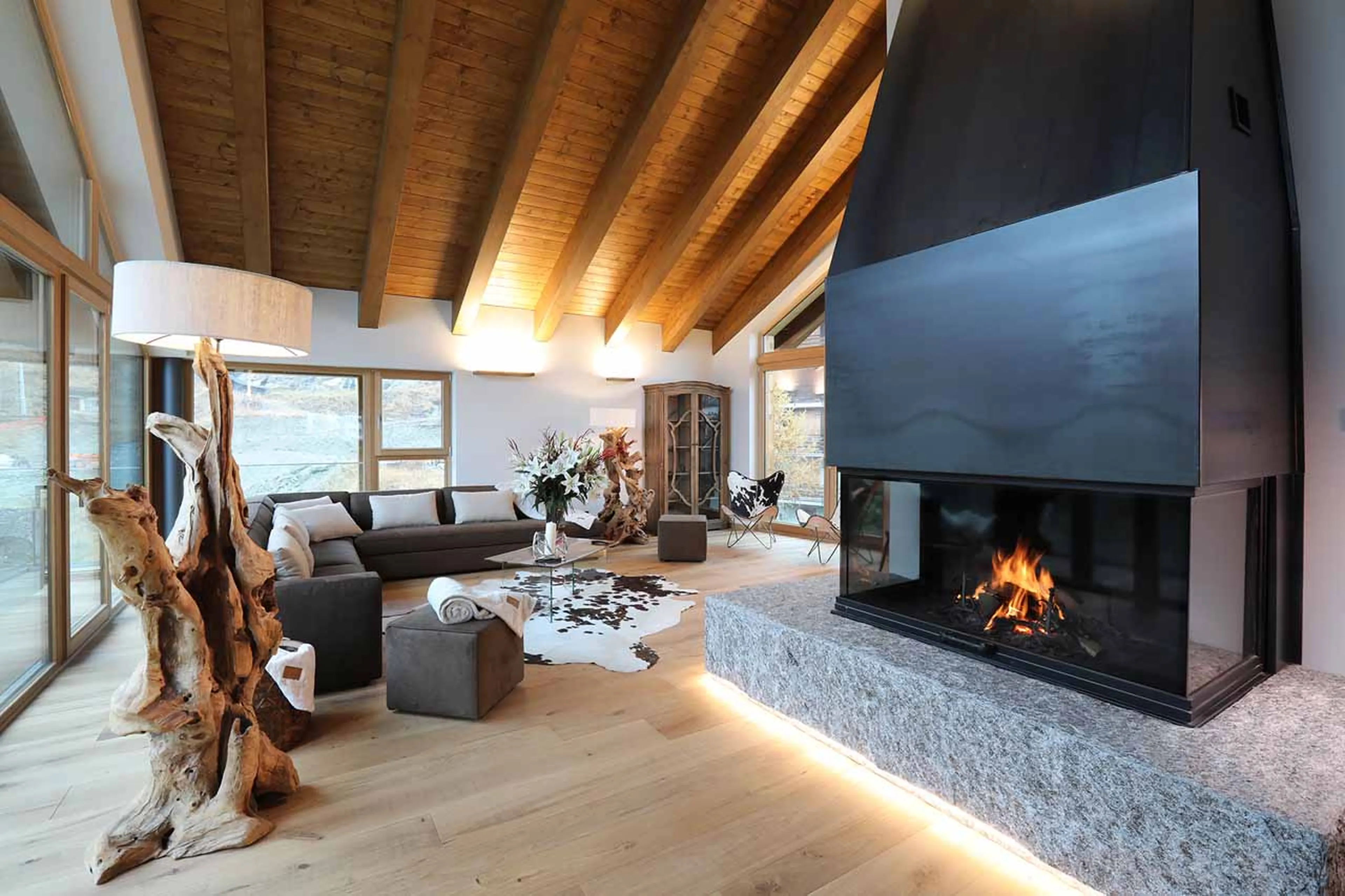 Fireplace in living area at Chalet Blanc in Cervinia