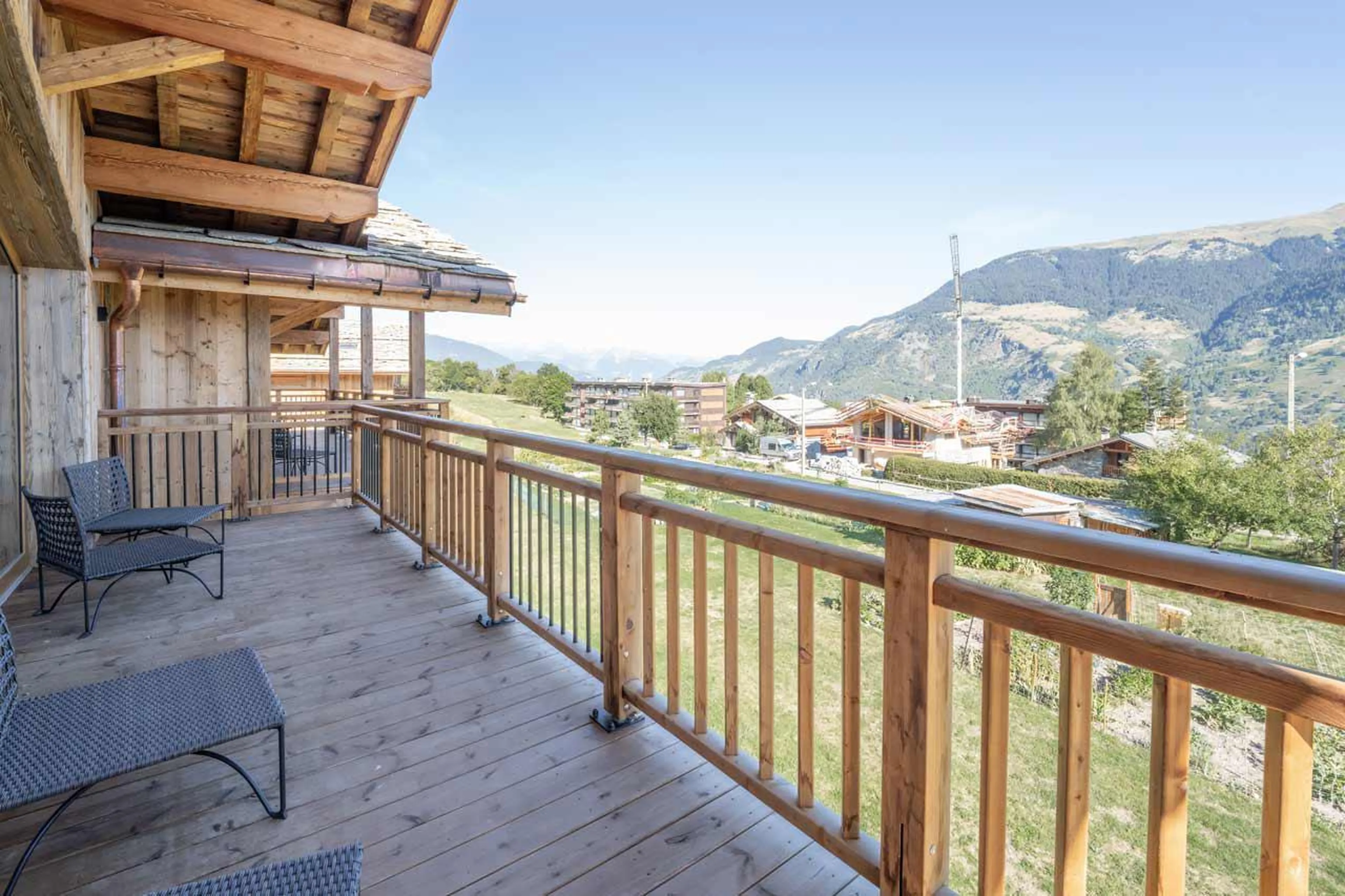 Mountain views from balcony of Chalet Bois de l'Abbaye in Courchevel Le Praz