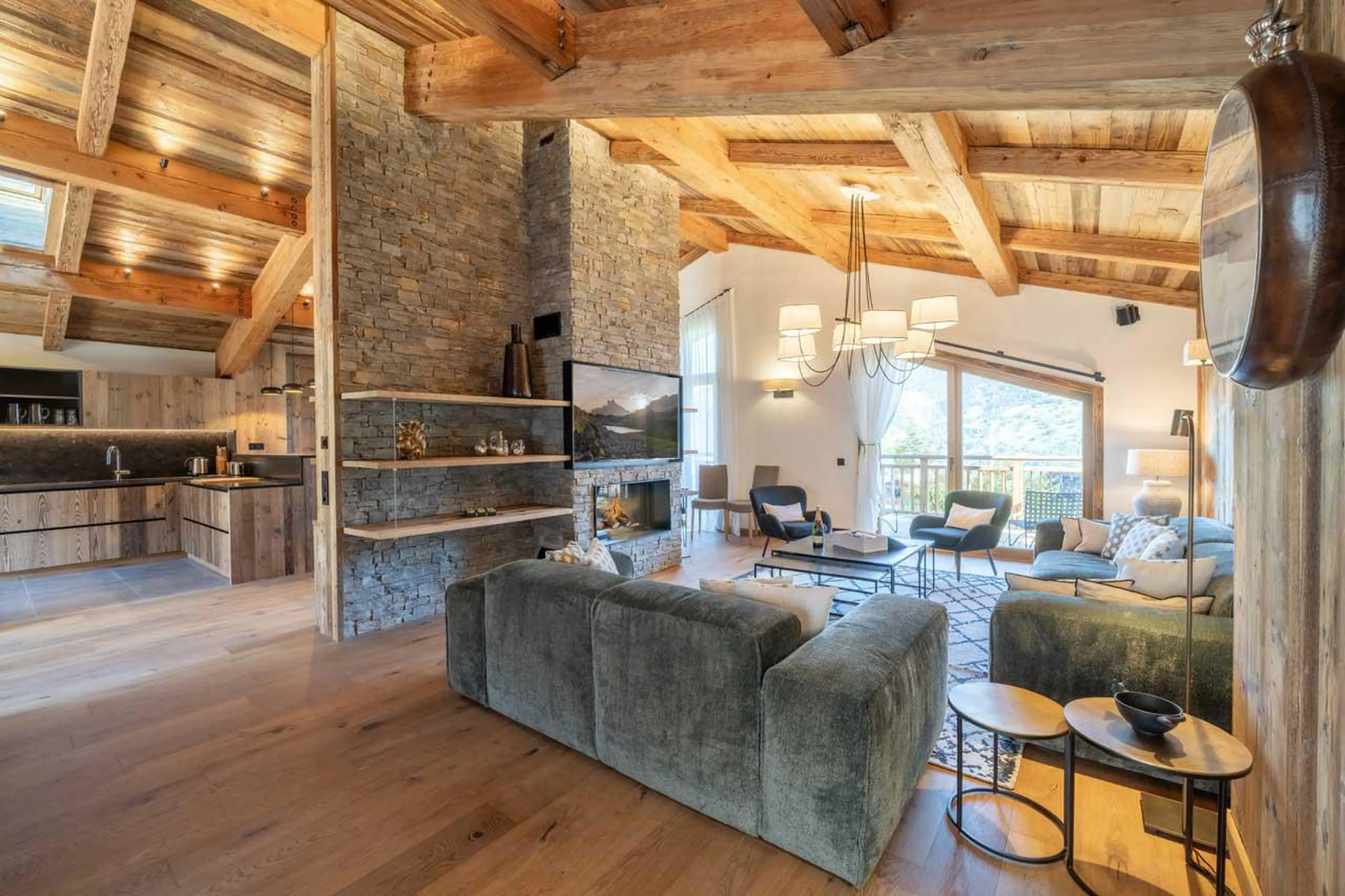 Living room opens onto terrace at Chalet Bois de l'Abbaye in Courchevel Le Praz