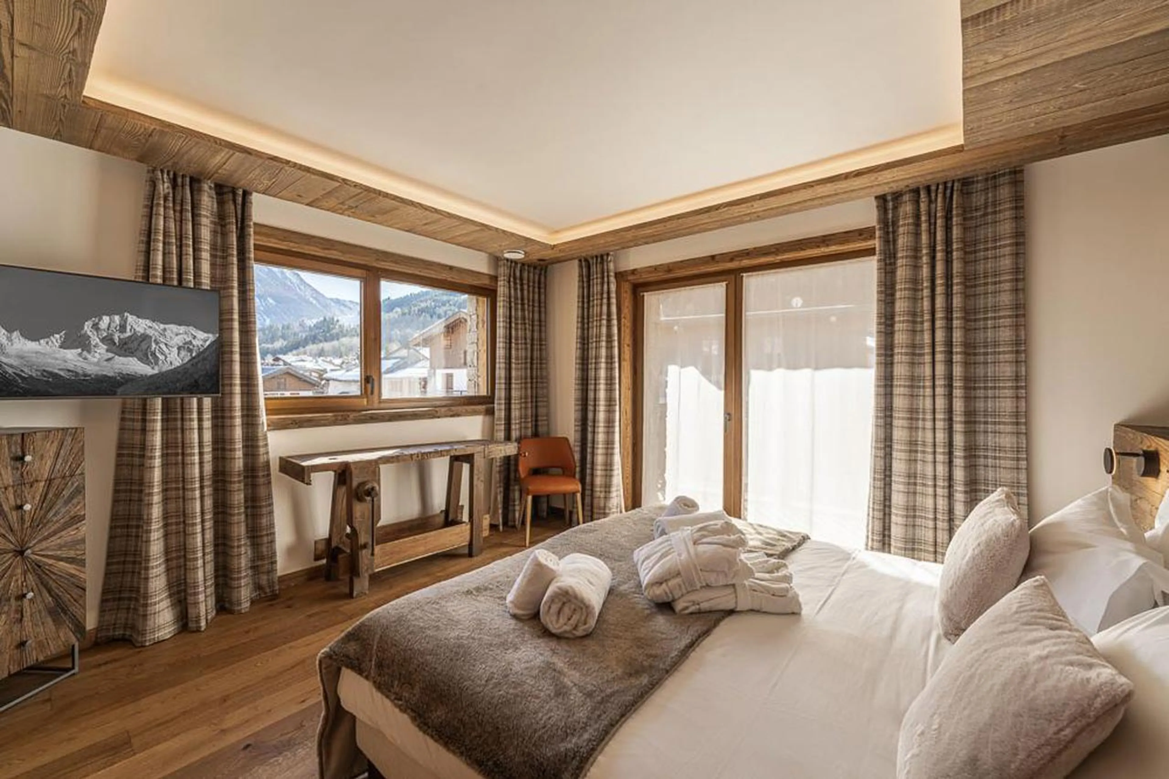 Bedroom two with mountain view at Chalet Bois des Barmes in Courchevel La Praz