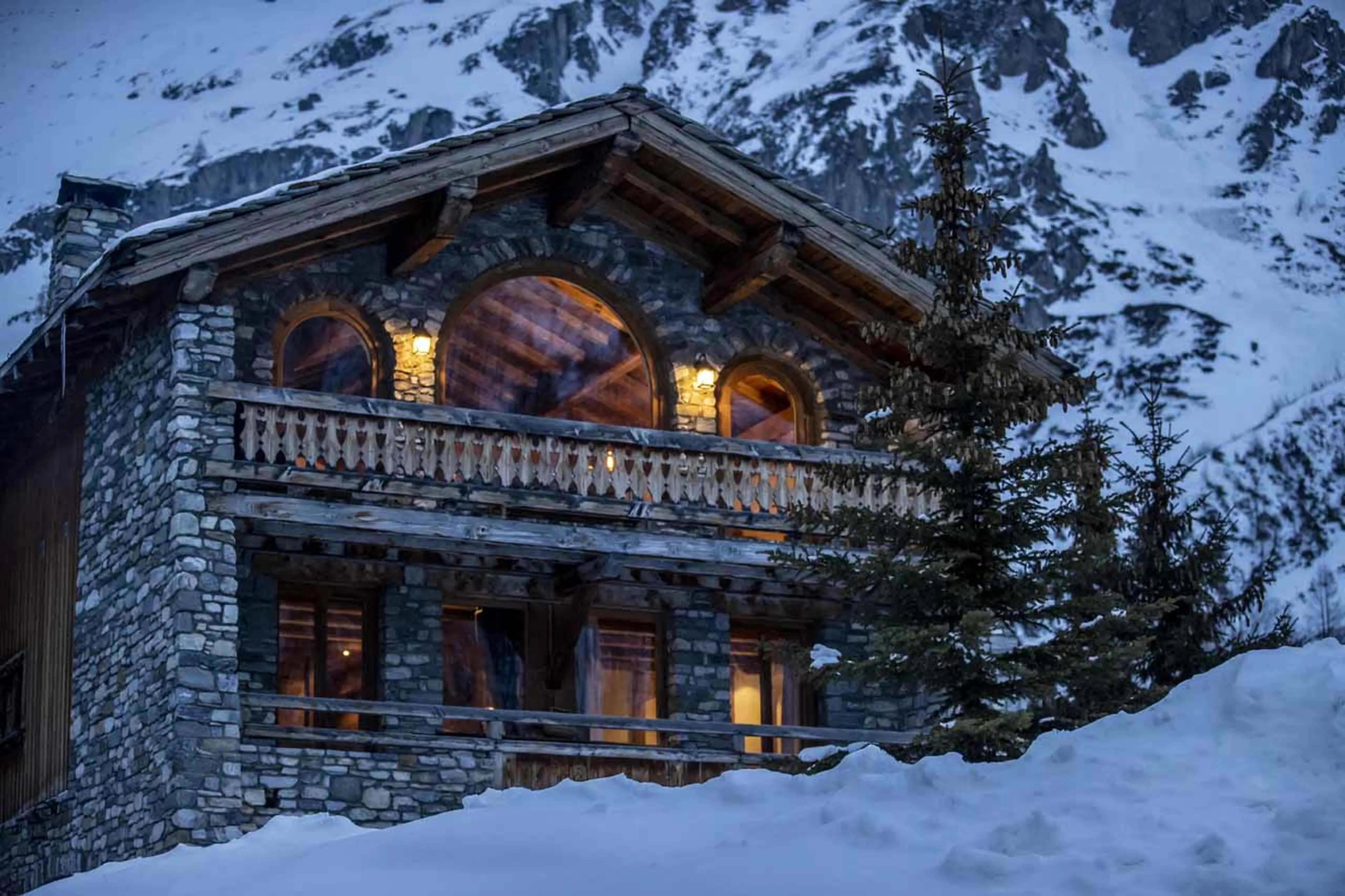 Exterior of Chalet La Bouclia at night in val d'Isere