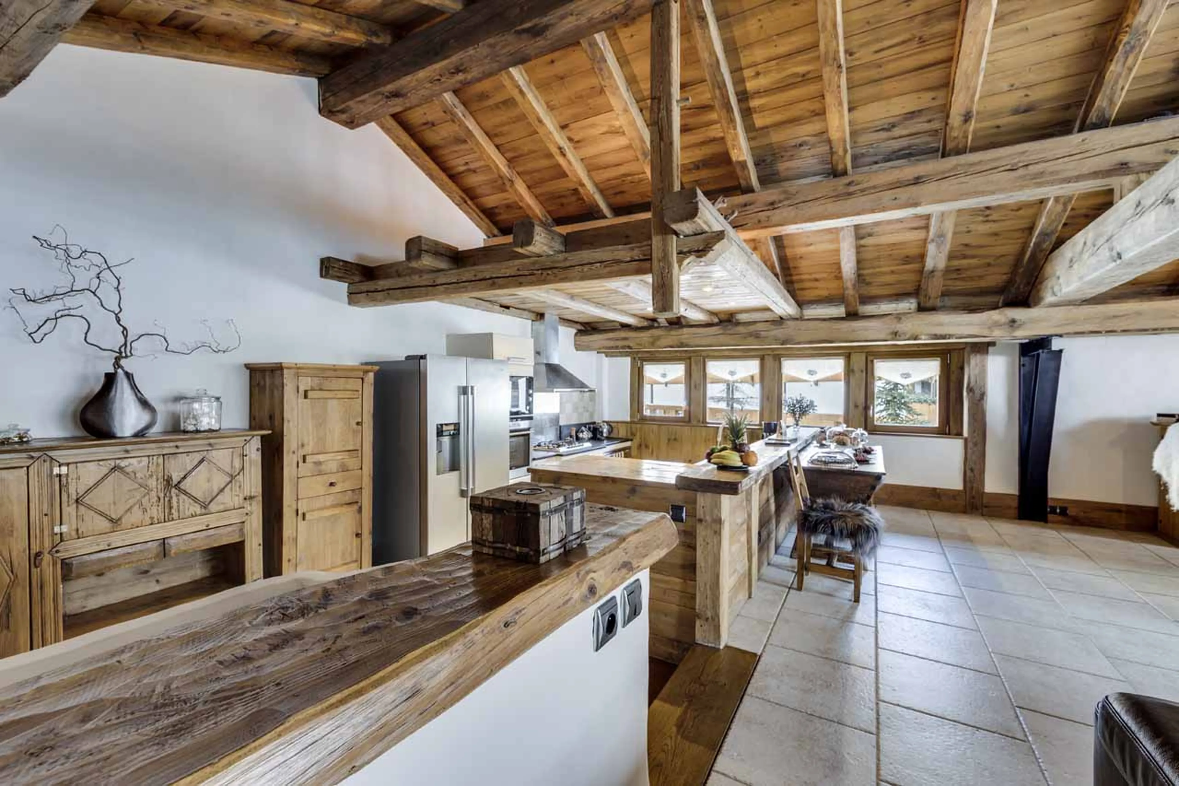 Living area and kitchen at Chalet La Bouclia in Val d'Isere