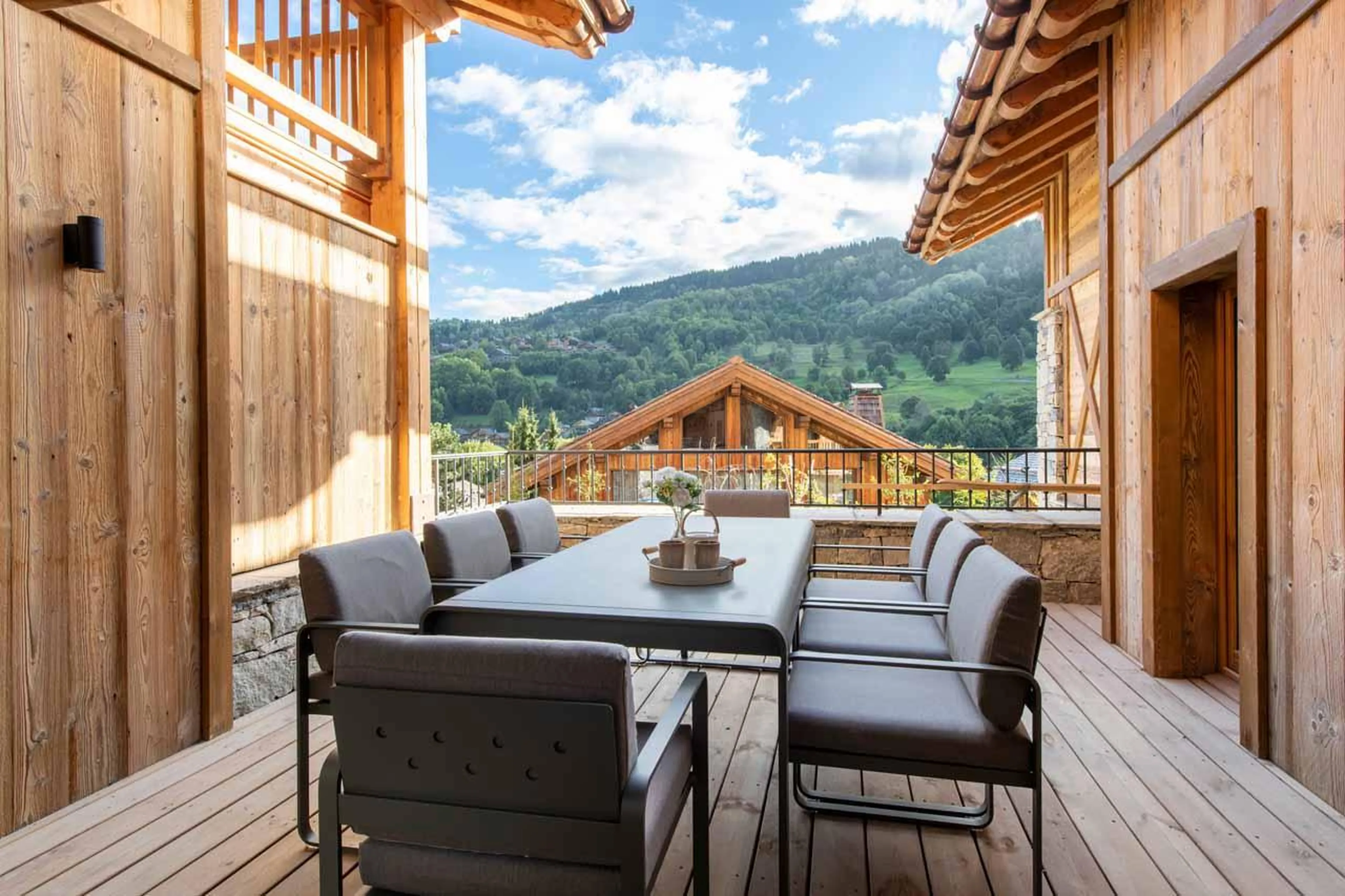 Al fresco dining on the terrace in Chalet Caribou, Meribel