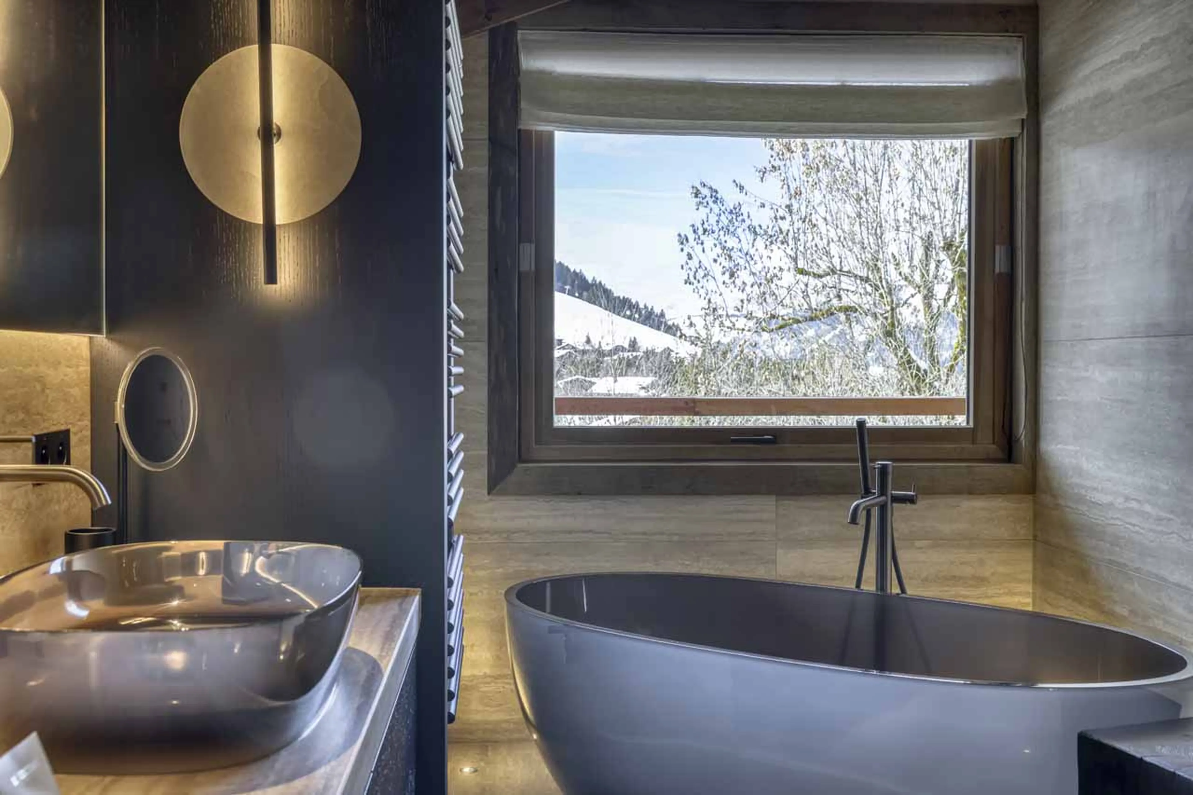 Bedroom 6 en-suite bath at Chalet Cham Lou Ka in Megeve