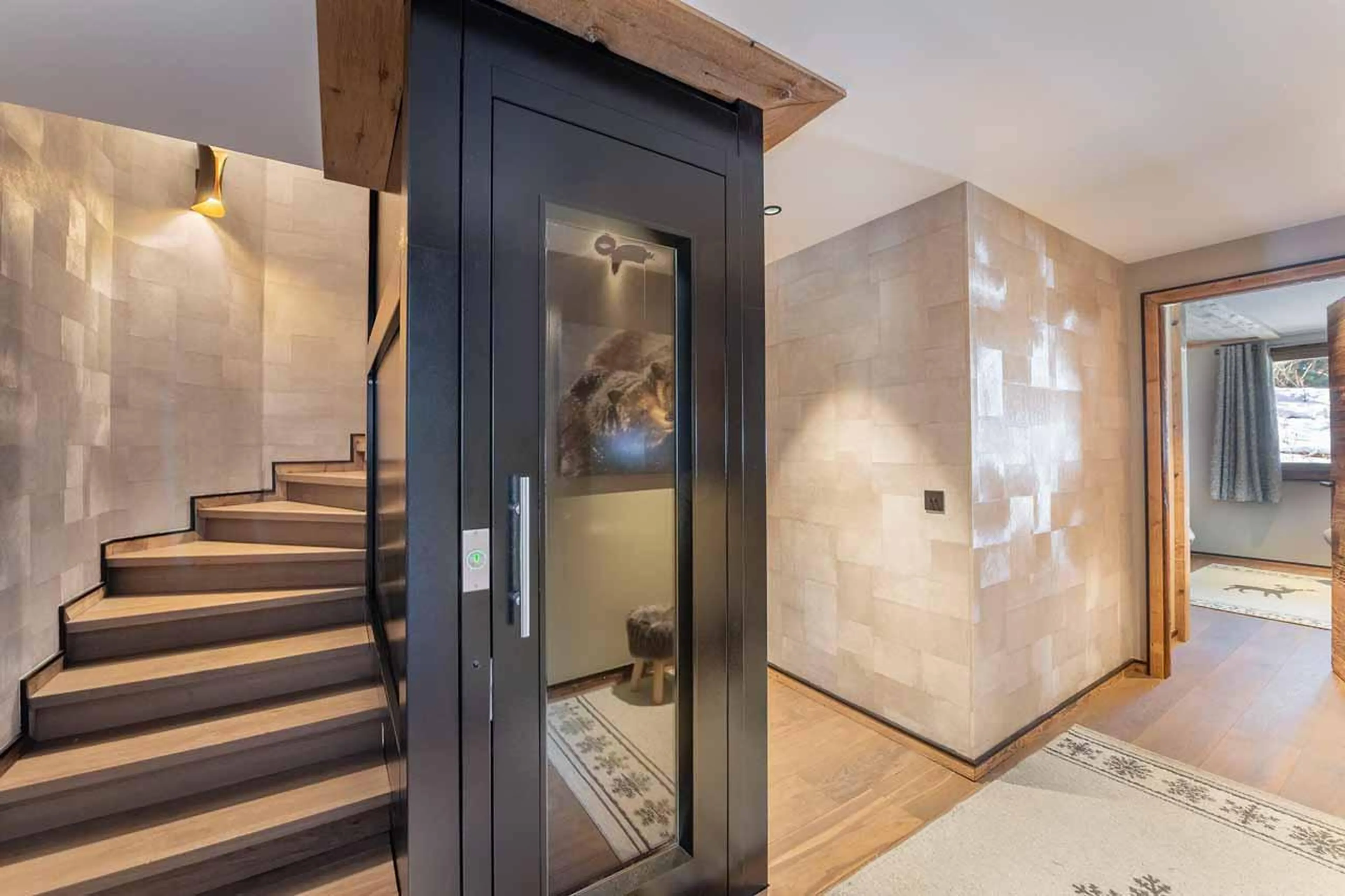 Staircase and elevator at Chalet Chergui in Meribel