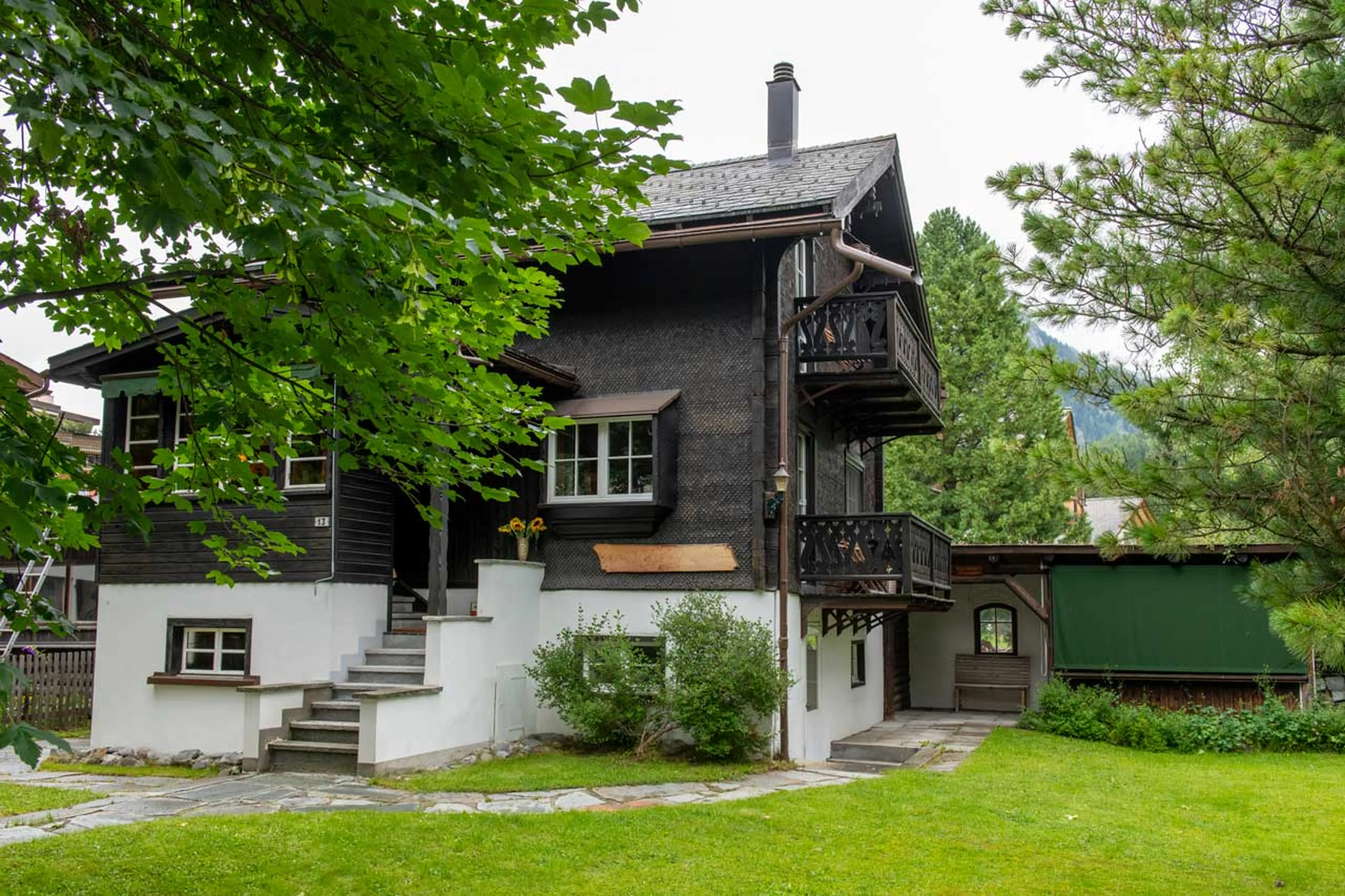 Exterior in summer at Chalet Chocolate Box in Davos