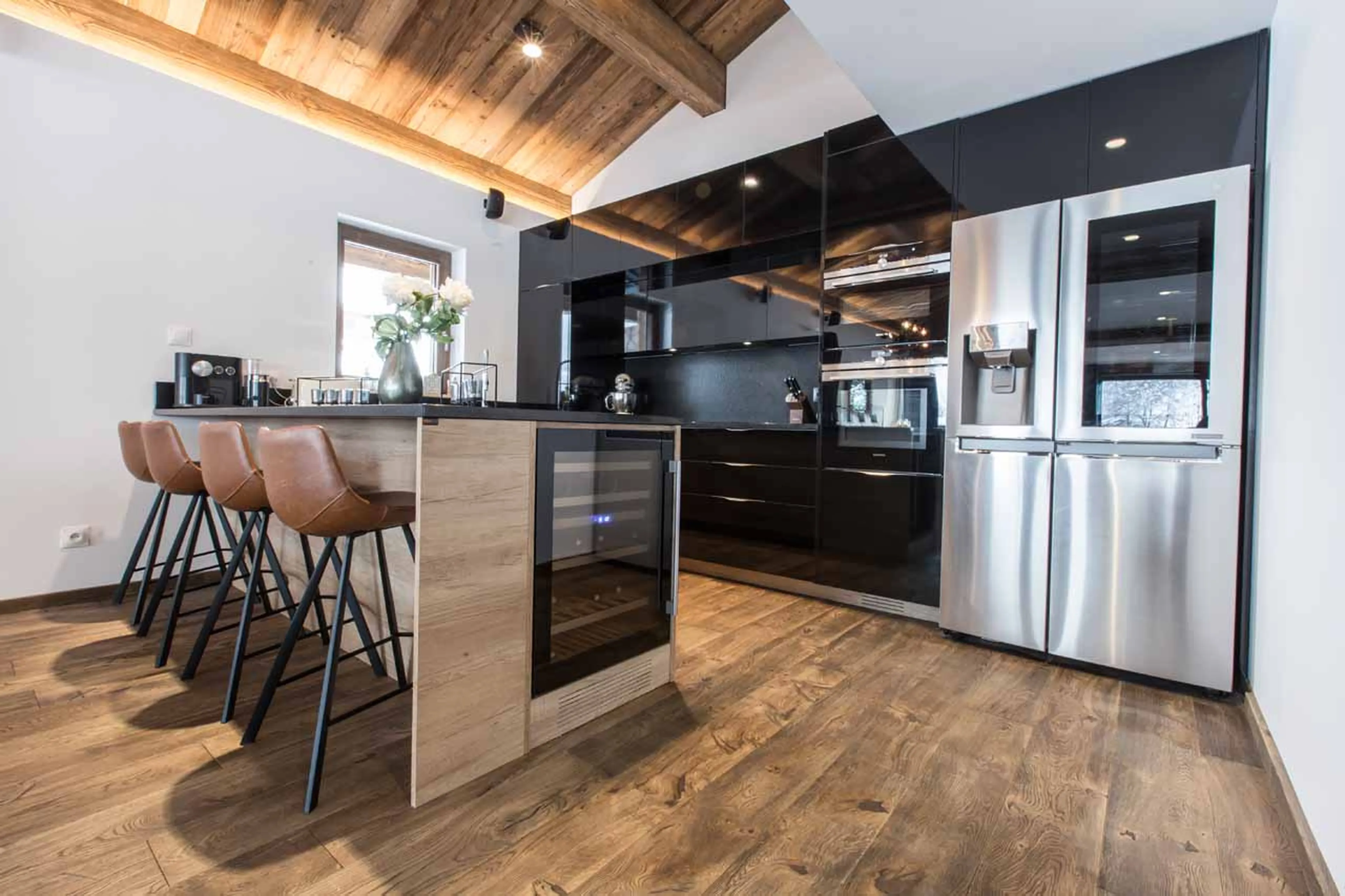 Kitchen with breakfast bar at Chalet Clos Saint Jean in Les Gets