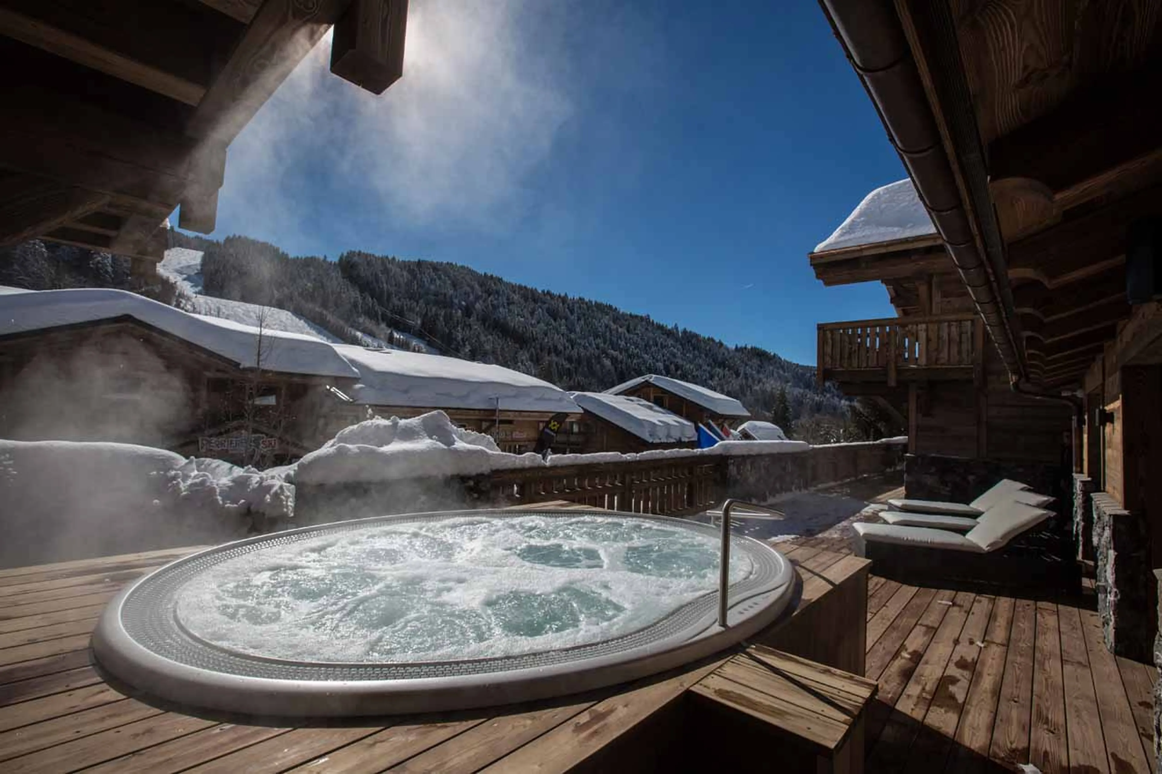 Terrace and hot tub at Chalet Clos Saint Jean in Les Gets