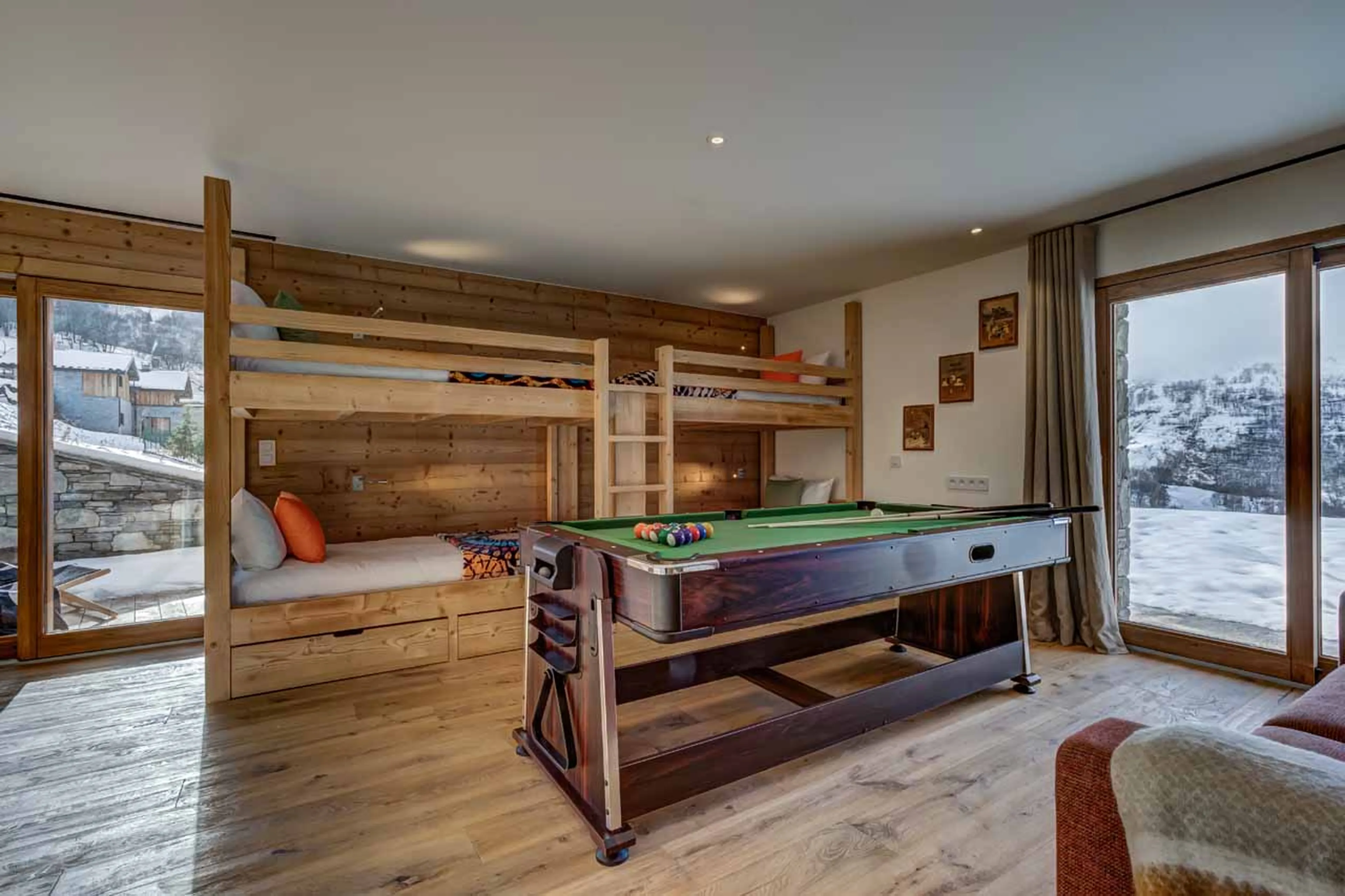 Bunk room with terrace access at Chalet Constantia in St Martin de Belleville