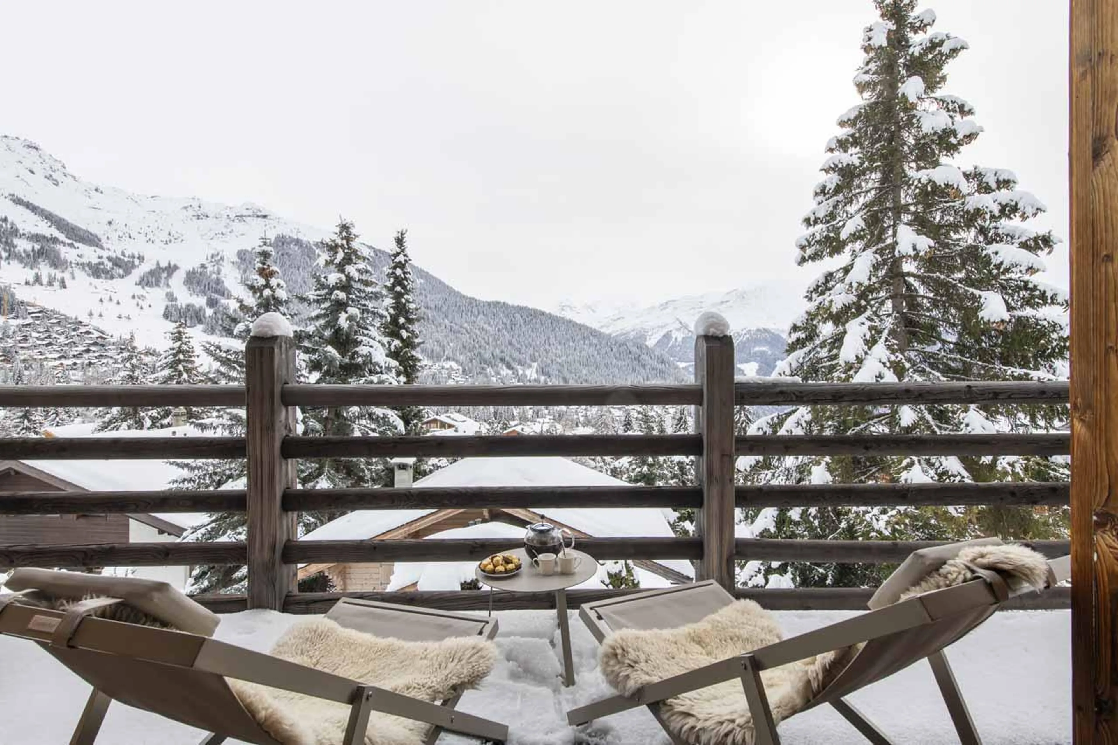 Balcony overlooking the mountain peaks at Chalet Cortil in Verbier