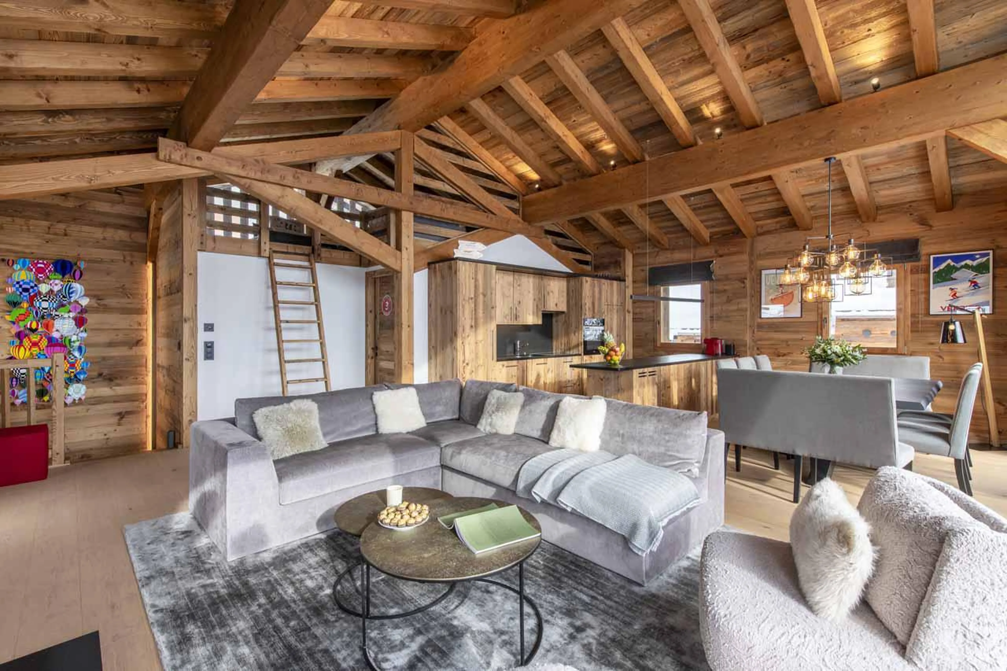 Living space with double-height vaulted ceilings at Chalet Cortil in Verbier