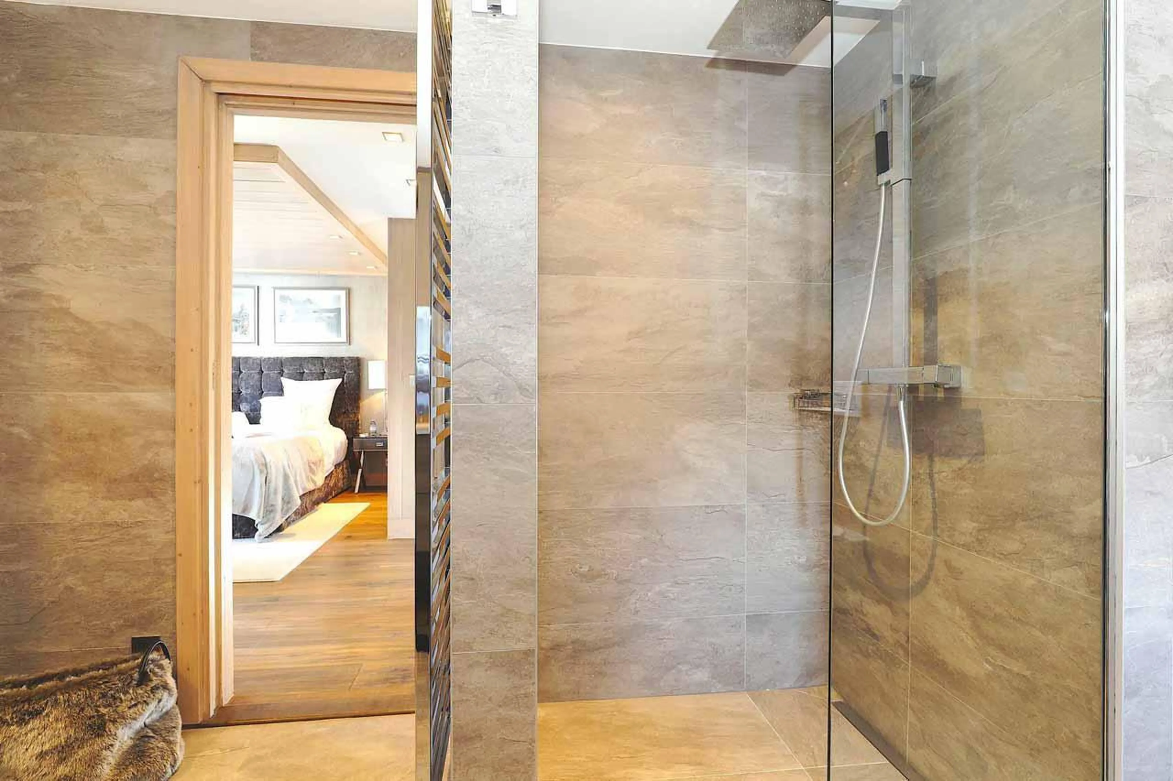 Shower in en-suite bathroom at Chalet Cortina in Courchevel 1650