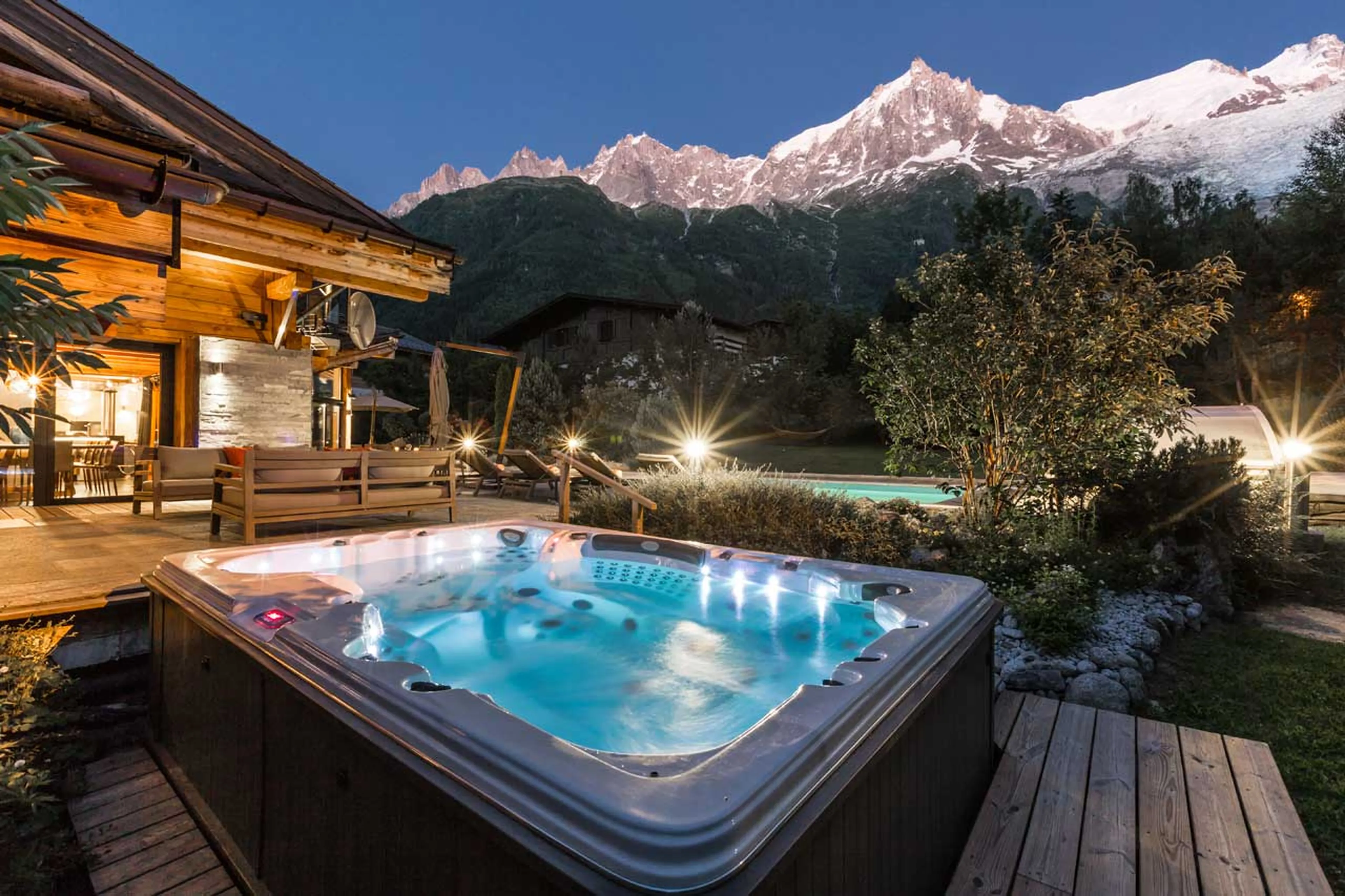 Outdoor hot tub with mountain views at Chalet Couttet in Chamonix