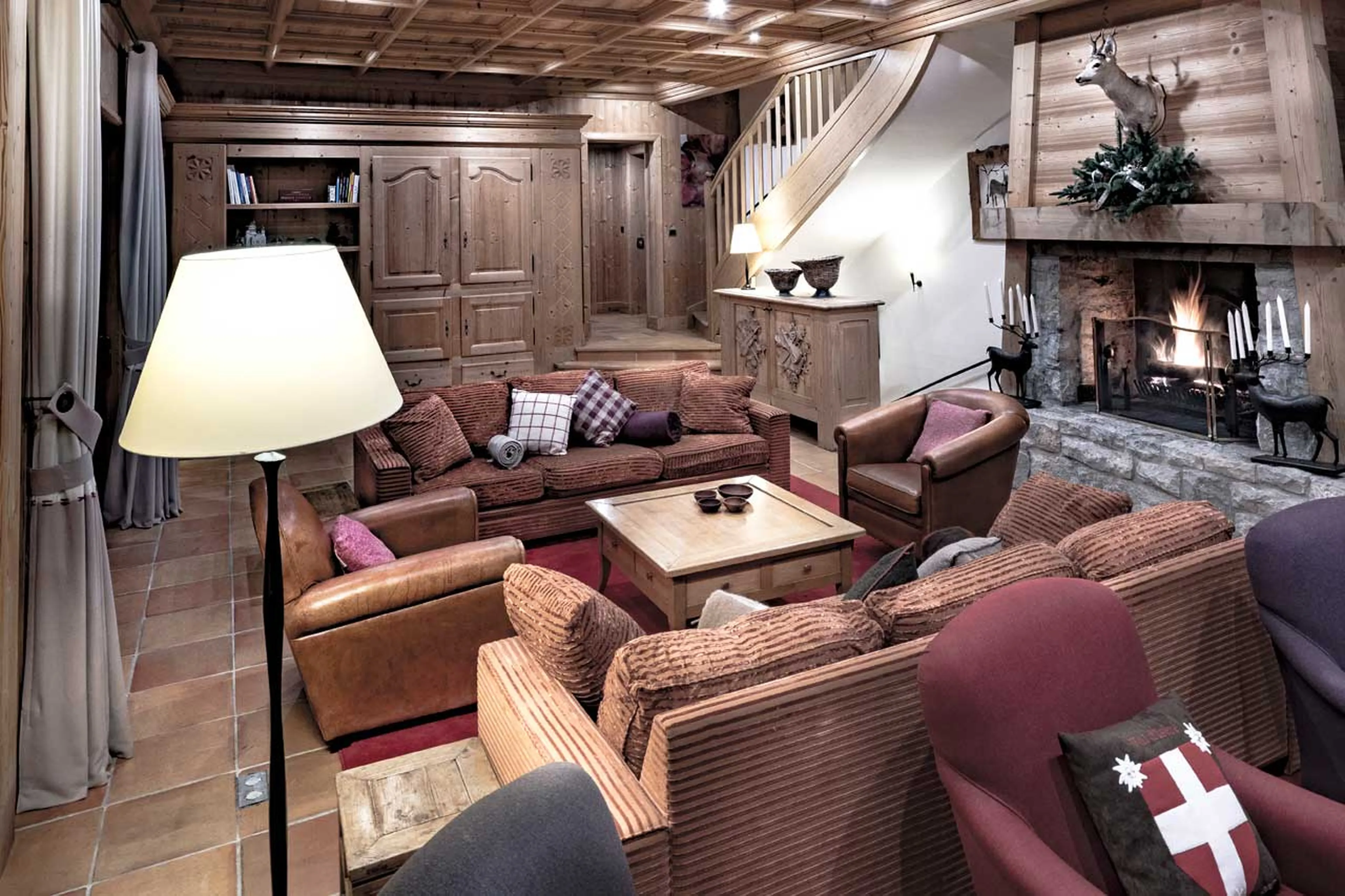 Comfortable sofas in living area at Chalet Cristal A in Val d’Isere