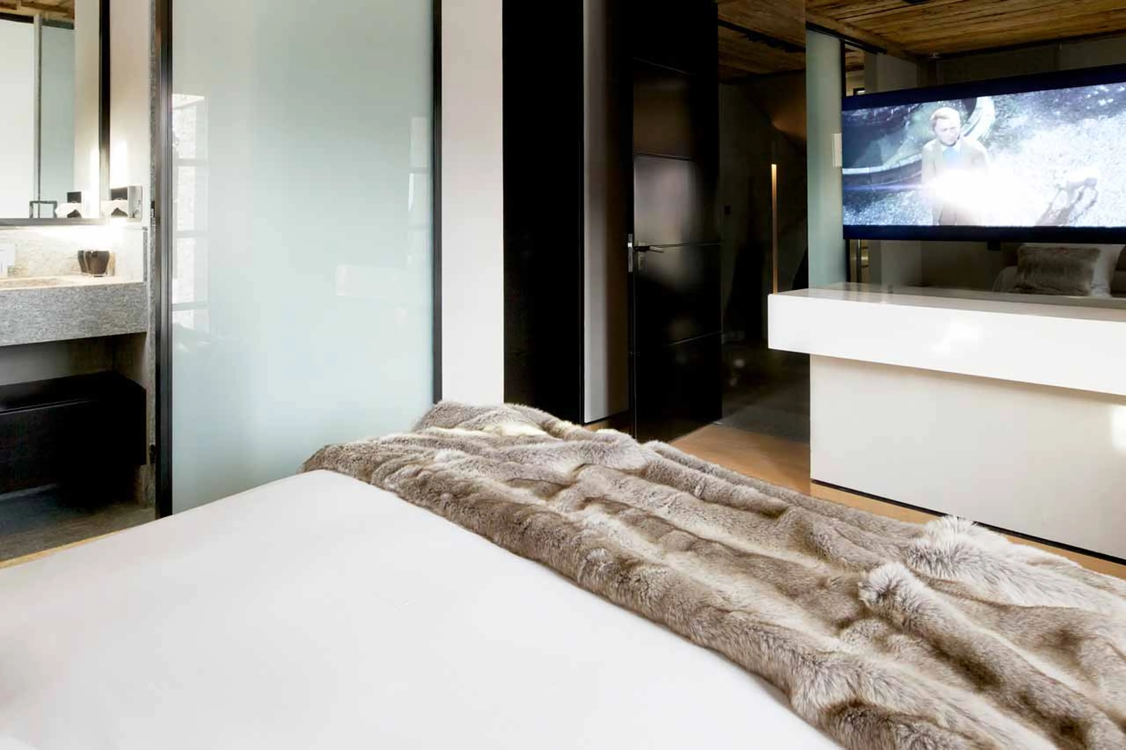 TV in bedroom two at Chalet Cyanella in Megeve