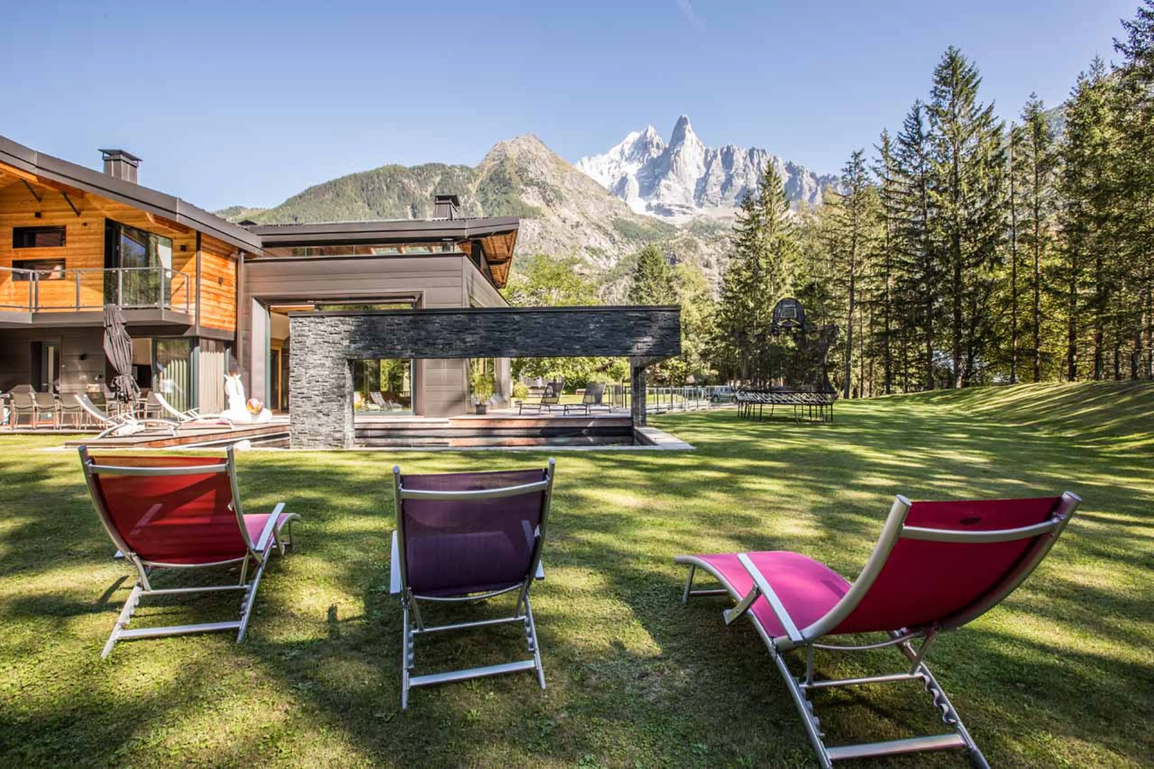 Garden with sunloungers at Chalet Dalmore in Chamonix in summer