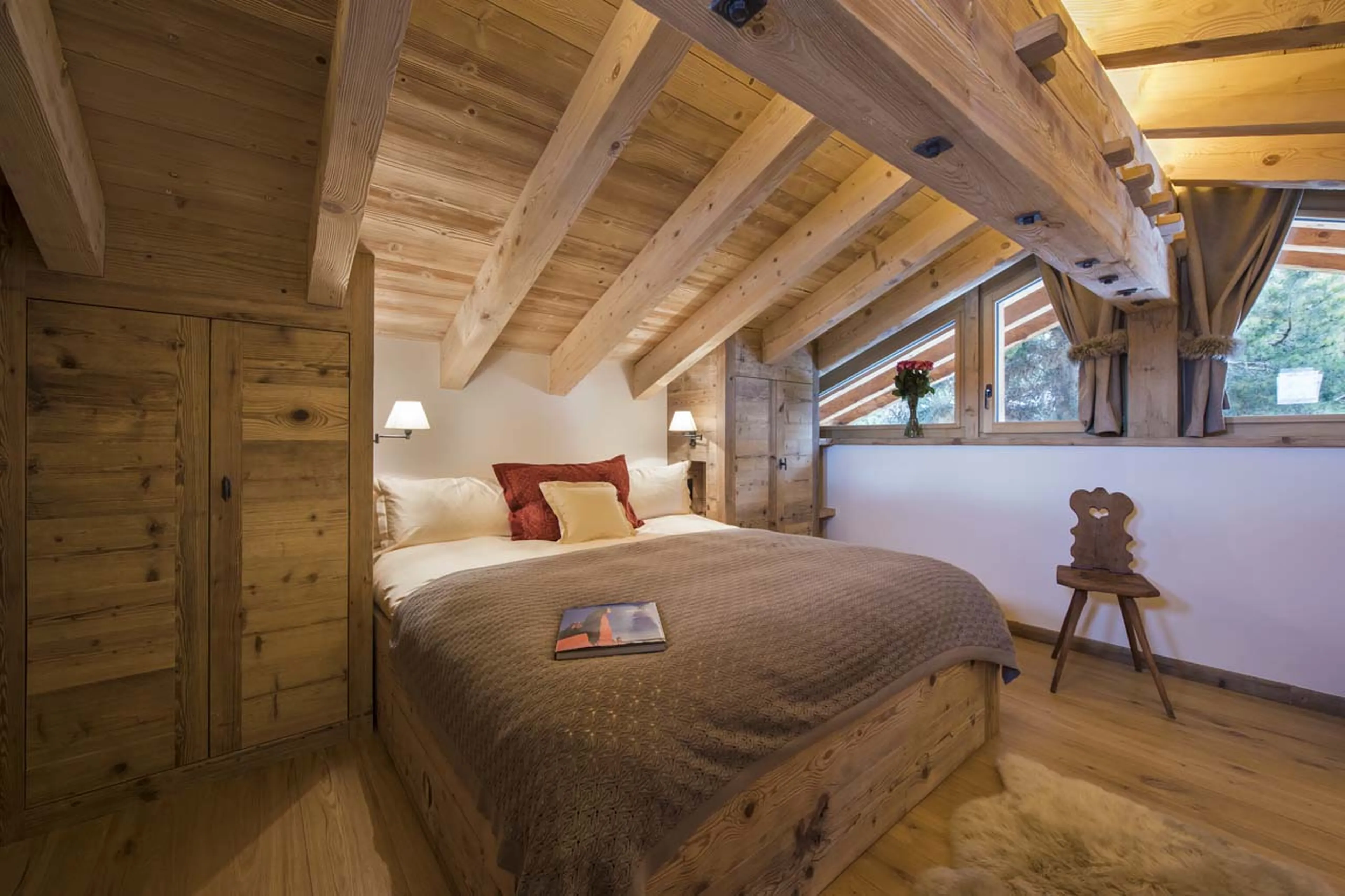 Bedroom three under eaves in Chalet Delormes in Verbier